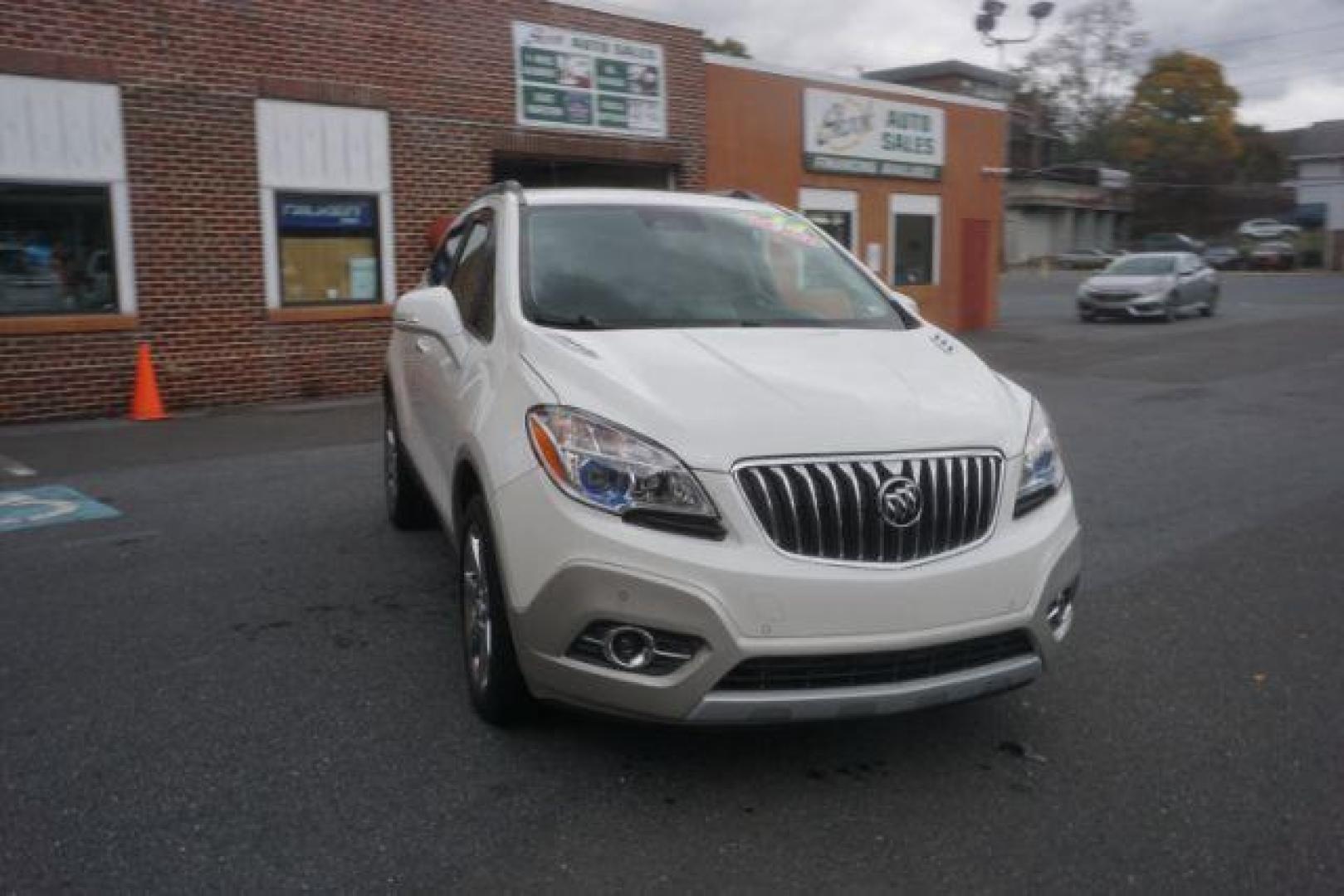 2014 White Pearl Tricoat Buick Encore Premium AWD (KL4CJHSB1EB) with an 1.4L L4 DOHC 16V TURBO engine, 6-Speed Automatic transmission, located at 312 Centre Ave, Schuylkill Haven, PA, 17972, (570) 593-5278, 40.638130, -76.177383 - navigation system, power sunroof, bose premium stereo - Photo#5