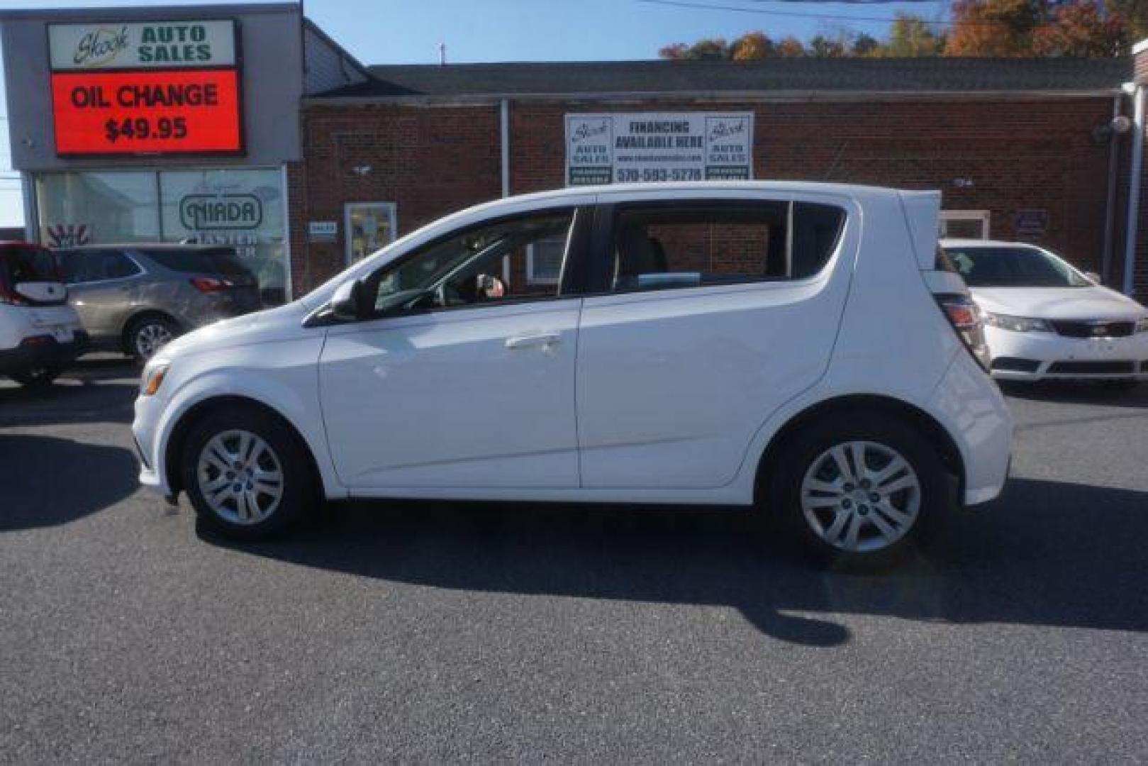 2017 White Chevrolet Sonic FL Auto Hatchback (1G1JG6SH8H4) with an 1.8L L4 DOHC 24V engine, 6-Speed Automatic transmission, located at 312 Centre Ave, Schuylkill Haven, PA, 17972, (570) 593-5278, 40.638130, -76.177383 - Photo#16