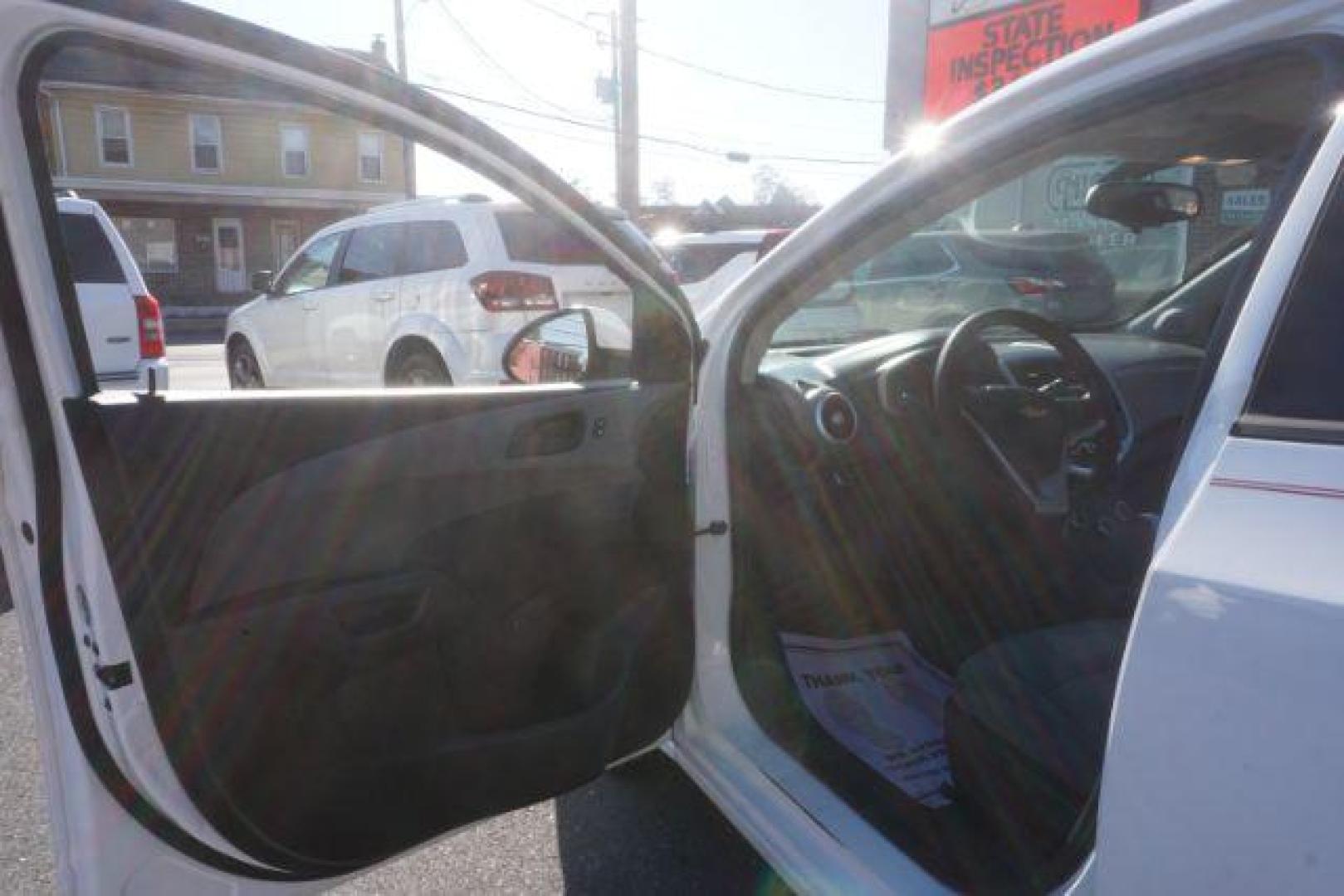 2017 White Chevrolet Sonic FL Auto Hatchback (1G1JG6SH8H4) with an 1.8L L4 DOHC 24V engine, 6-Speed Automatic transmission, located at 312 Centre Ave, Schuylkill Haven, PA, 17972, (570) 593-5278, 40.638130, -76.177383 - Photo#17