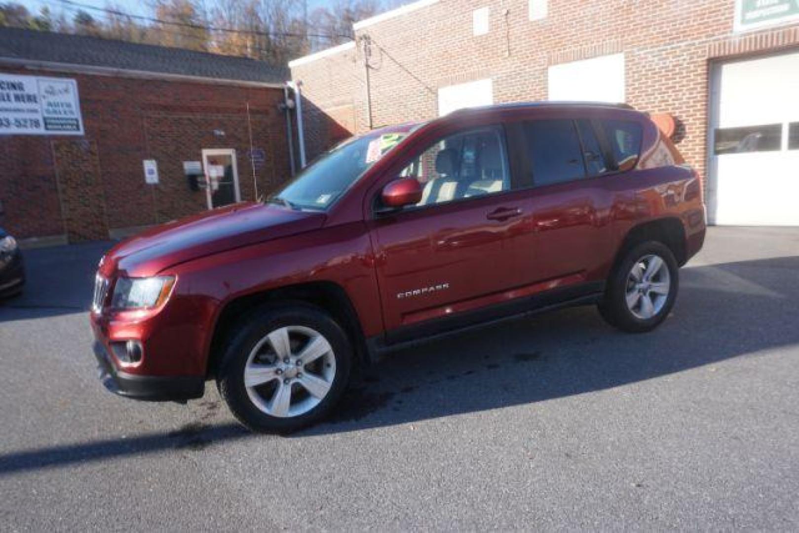 2014 Dp Cherry Red Crysta Jeep Compass Latitude FWD (1C4NJCEA1ED) with an 2.0L L4 DOHC 16V engine, Continuously Variabl transmission, located at 312 Centre Ave, Schuylkill Haven, PA, 17972, (570) 593-5278, 40.638130, -76.177383 - Photo#1