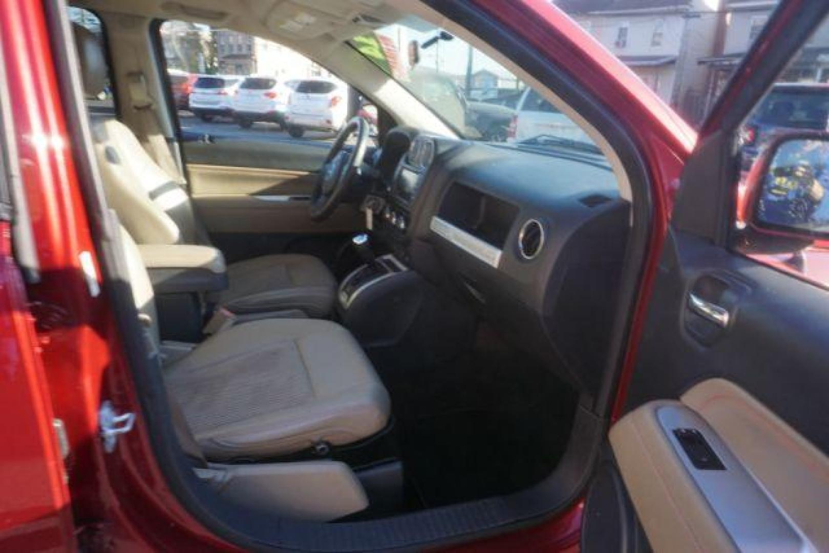 2014 Dp Cherry Red Crysta Jeep Compass Latitude FWD (1C4NJCEA1ED) with an 2.0L L4 DOHC 16V engine, Continuously Variabl transmission, located at 312 Centre Ave, Schuylkill Haven, PA, 17972, (570) 593-5278, 40.638130, -76.177383 - Photo#53