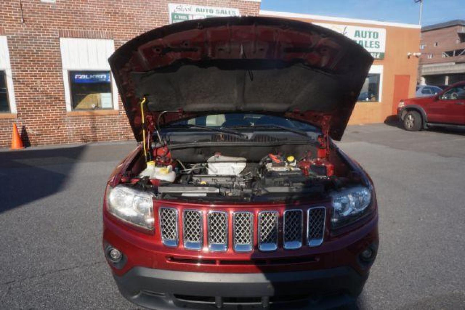 2014 Dp Cherry Red Crysta Jeep Compass Latitude FWD (1C4NJCEA1ED) with an 2.0L L4 DOHC 16V engine, Continuously Variabl transmission, located at 312 Centre Ave, Schuylkill Haven, PA, 17972, (570) 593-5278, 40.638130, -76.177383 - Photo#57