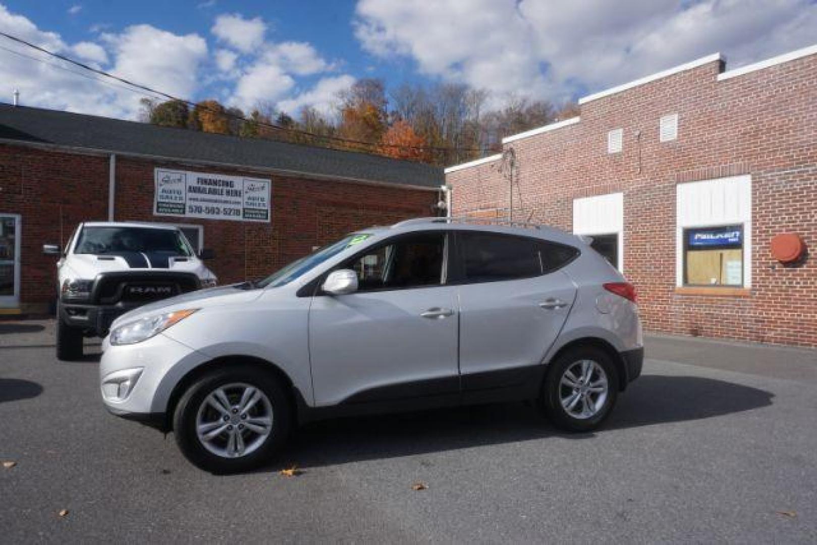 2013 Diamond Silver Metallic Hyundai Tucson GLS AWD (KM8JUCAC9DU) with an 2.4L L4 DOHC 16V engine, 6-Speed Automatic transmission, located at 312 Centre Ave, Schuylkill Haven, PA, 17972, (570) 593-5278, 40.638130, -76.177383 - Photo#0