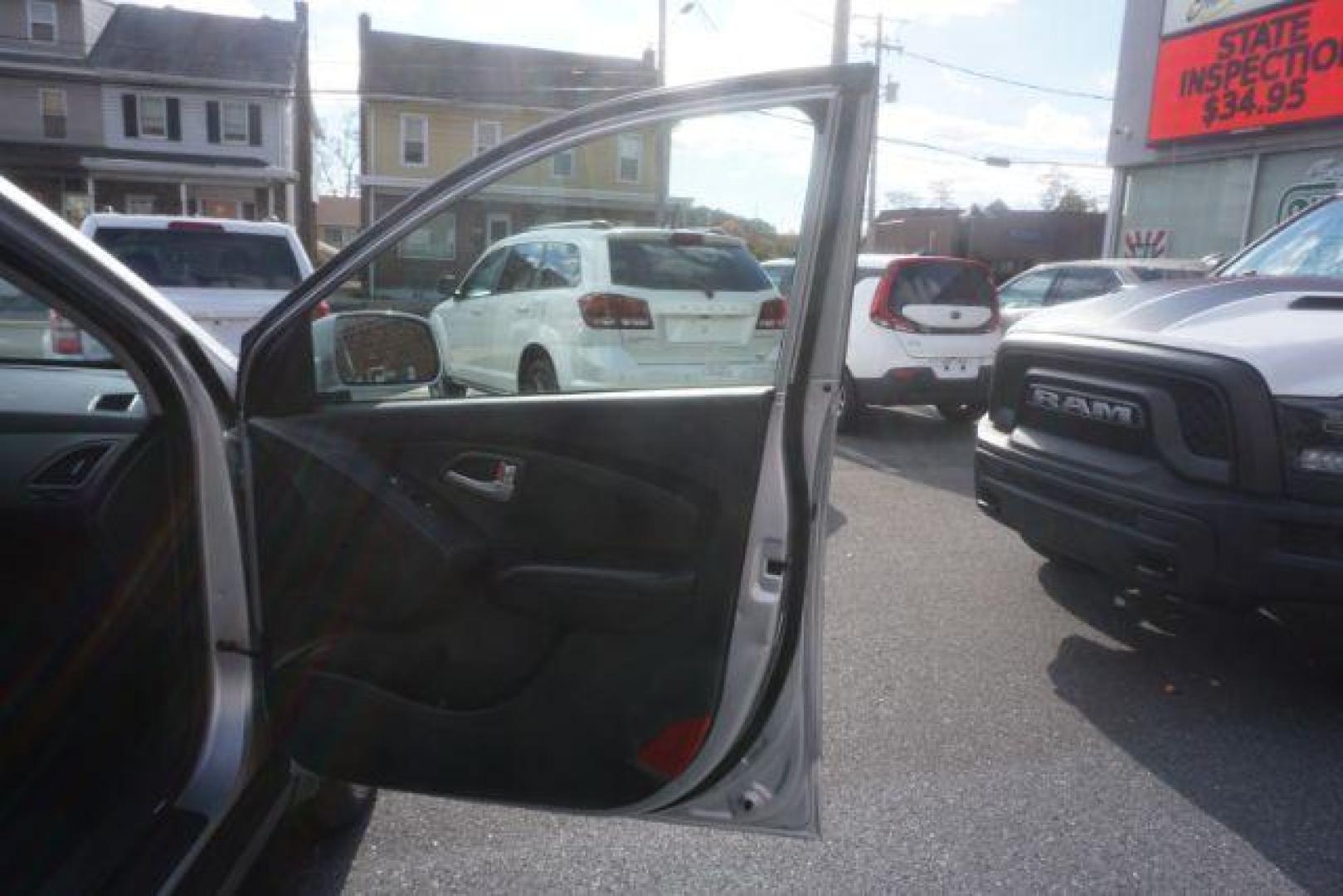 2013 Diamond Silver Metallic Hyundai Tucson GLS AWD (KM8JUCAC9DU) with an 2.4L L4 DOHC 16V engine, 6-Speed Automatic transmission, located at 312 Centre Ave, Schuylkill Haven, PA, 17972, (570) 593-5278, 40.638130, -76.177383 - Photo#46