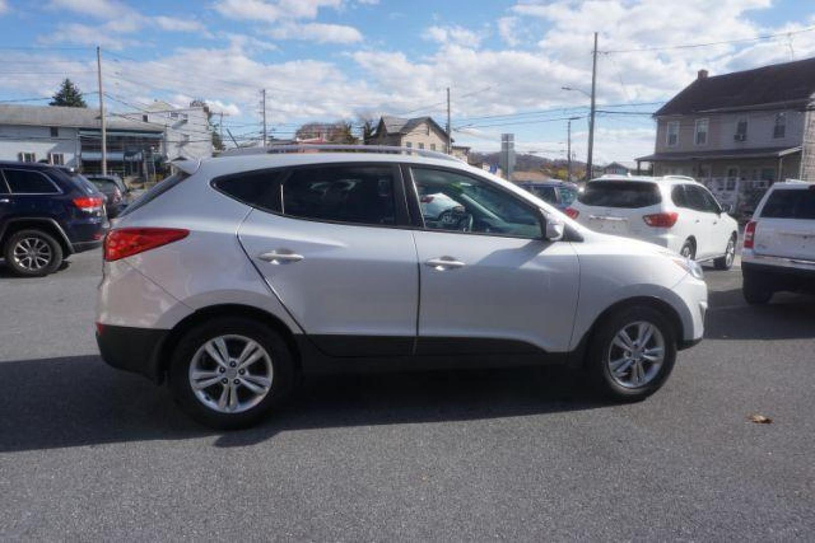 2013 Diamond Silver Metallic Hyundai Tucson GLS AWD (KM8JUCAC9DU) with an 2.4L L4 DOHC 16V engine, 6-Speed Automatic transmission, located at 312 Centre Ave, Schuylkill Haven, PA, 17972, (570) 593-5278, 40.638130, -76.177383 - Photo#8