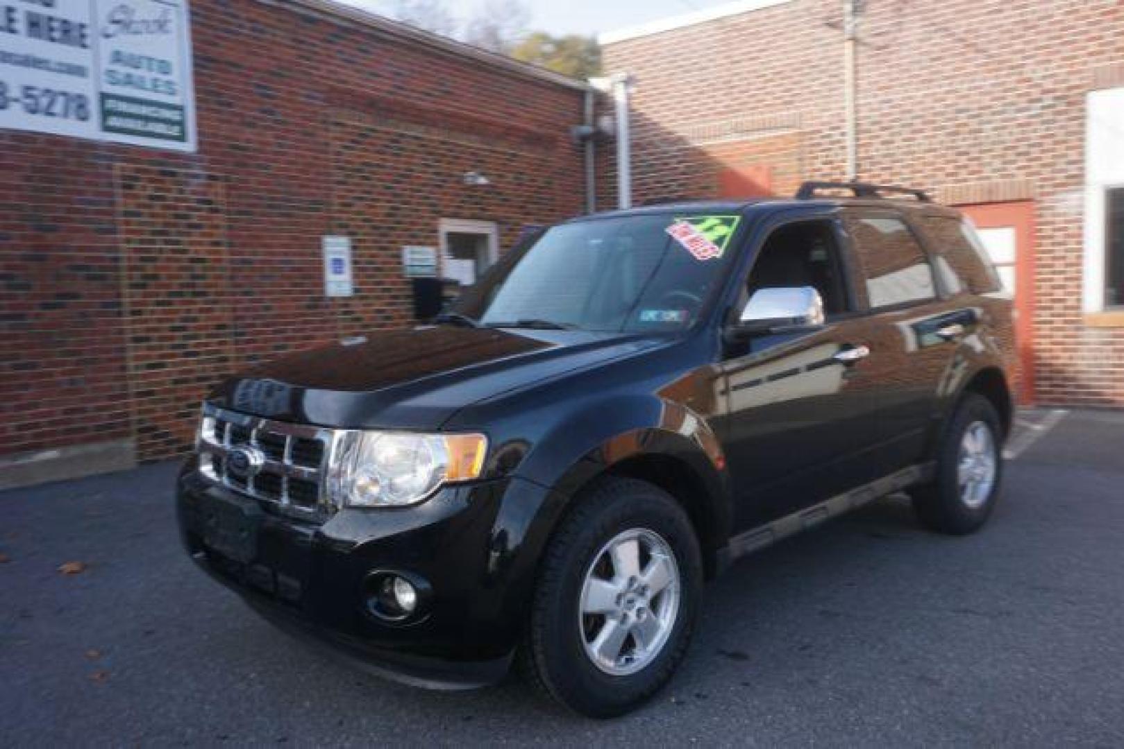 2012 Black Ford Escape XLT 4WD (1FMCU9D71CK) with an 2.5L L4 DOHC 16V engine, 6-Speed Automatic transmission, located at 312 Centre Ave, Schuylkill Haven, PA, 17972, (570) 593-5278, 40.638130, -76.177383 - Photo#1