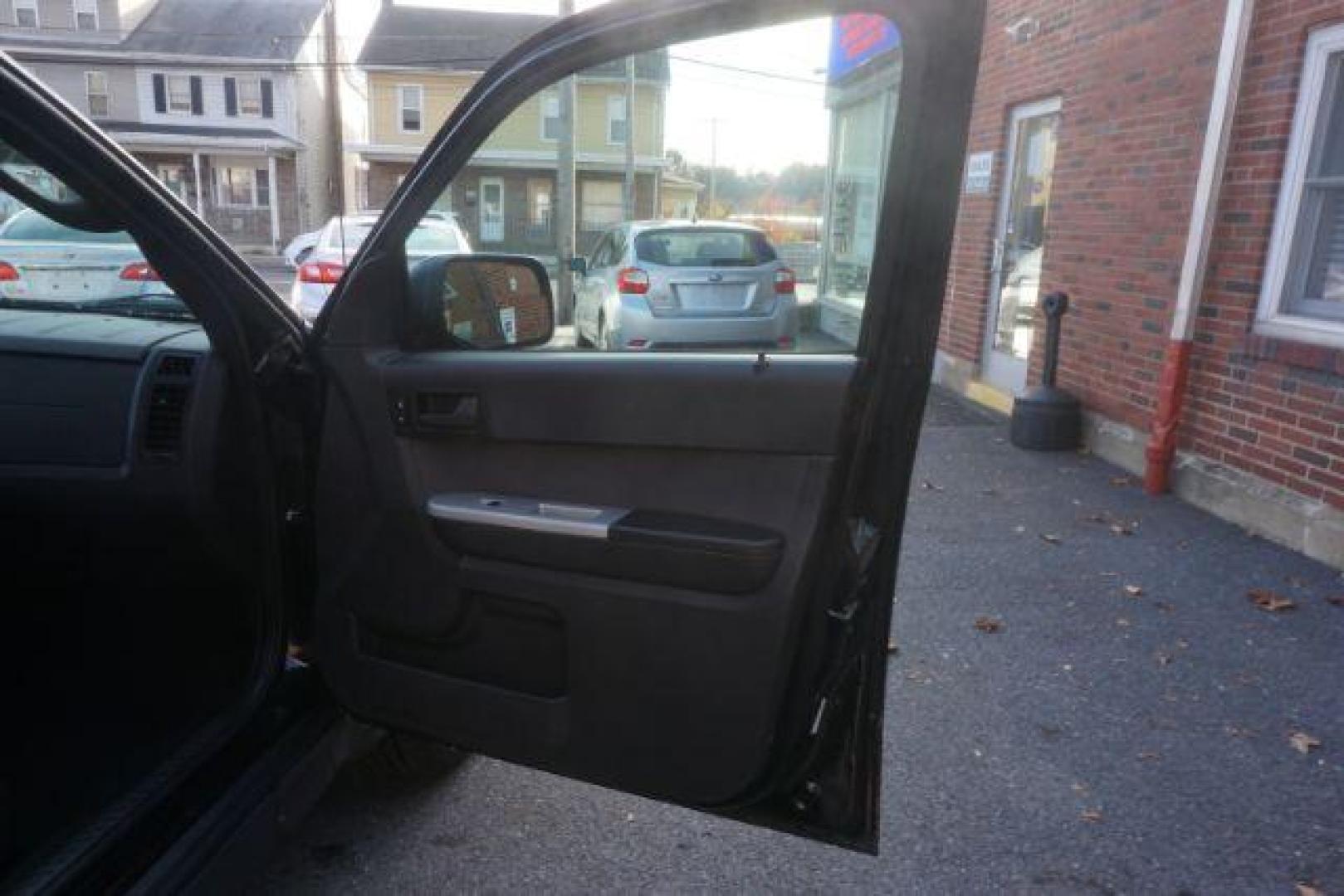 2012 Black Ford Escape XLT 4WD (1FMCU9D71CK) with an 2.5L L4 DOHC 16V engine, 6-Speed Automatic transmission, located at 312 Centre Ave, Schuylkill Haven, PA, 17972, (570) 593-5278, 40.638130, -76.177383 - Photo#47