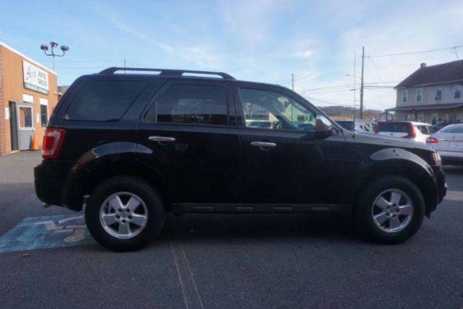 2012 Black Ford Escape XLT 4WD (1FMCU9D71CK) with an 2.5L L4 DOHC 16V engine, 6-Speed Automatic transmission, located at 312 Centre Ave, Schuylkill Haven, PA, 17972, (570) 593-5278, 40.638130, -76.177383 - Photo#7