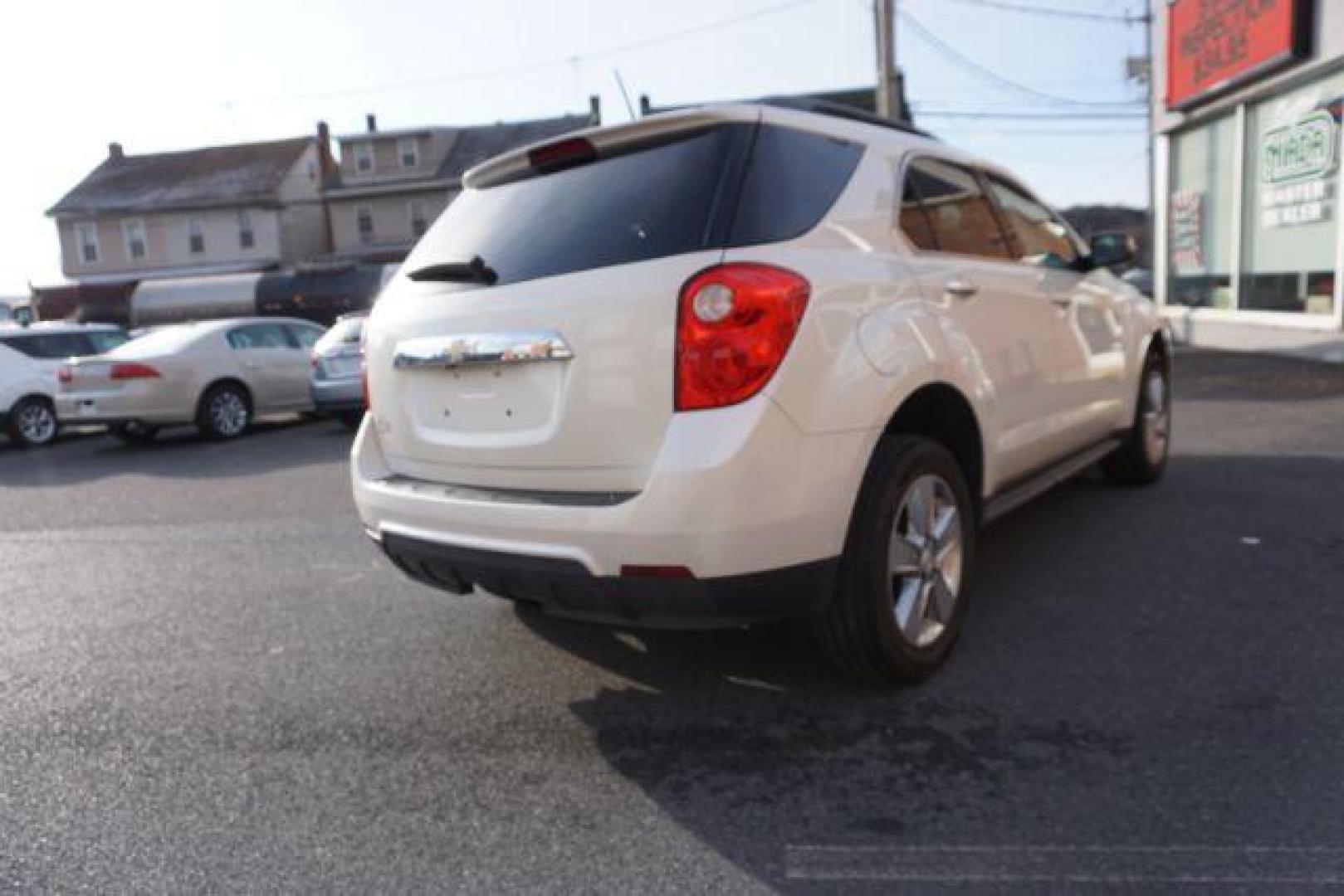 2013 Summit White /Jet Black Cloth Interior Chevrolet Equinox 2LT AWD (1GNFLNEK4DZ) with an 2.4L L4 DOHC 16V engine, 6-Speed Automatic transmission, located at 312 Centre Ave, Schuylkill Haven, PA, 17972, (570) 593-5278, 40.638130, -76.177383 - rear parking sensors, power drivers seat, power sunroof, remote engine starter, pioneer stereo - Photo#9