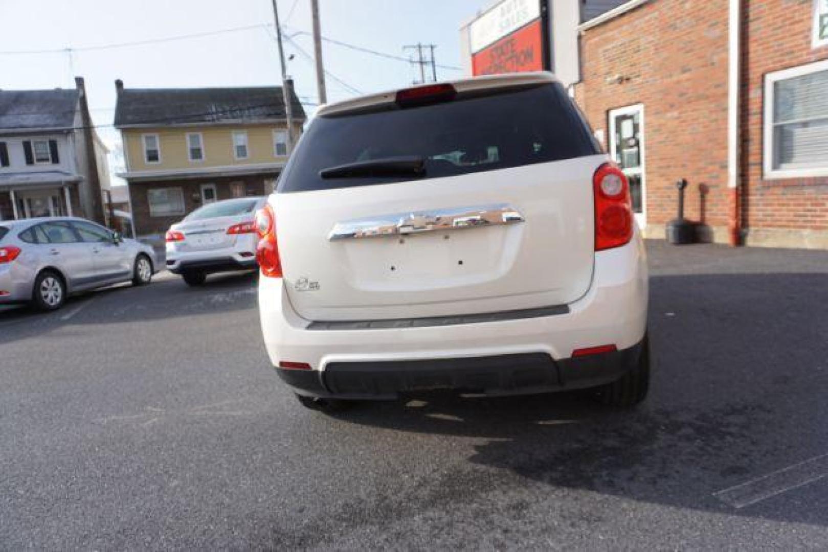 2013 Summit White /Jet Black Cloth Interior Chevrolet Equinox 2LT AWD (1GNFLNEK4DZ) with an 2.4L L4 DOHC 16V engine, 6-Speed Automatic transmission, located at 312 Centre Ave, Schuylkill Haven, PA, 17972, (570) 593-5278, 40.638130, -76.177383 - rear parking sensors, power drivers seat, power sunroof, remote engine starter, pioneer stereo - Photo#10