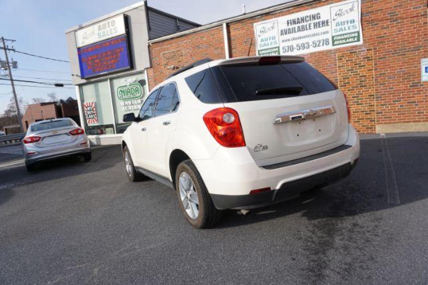 2013 Summit White /Jet Black Cloth Interior Chevrolet Equinox 2LT AWD (1GNFLNEK4DZ) with an 2.4L L4 DOHC 16V engine, 6-Speed Automatic transmission, located at 312 Centre Ave, Schuylkill Haven, PA, 17972, (570) 593-5278, 40.638130, -76.177383 - rear parking sensors, power drivers seat, power sunroof, remote engine starter, pioneer stereo - Photo#11