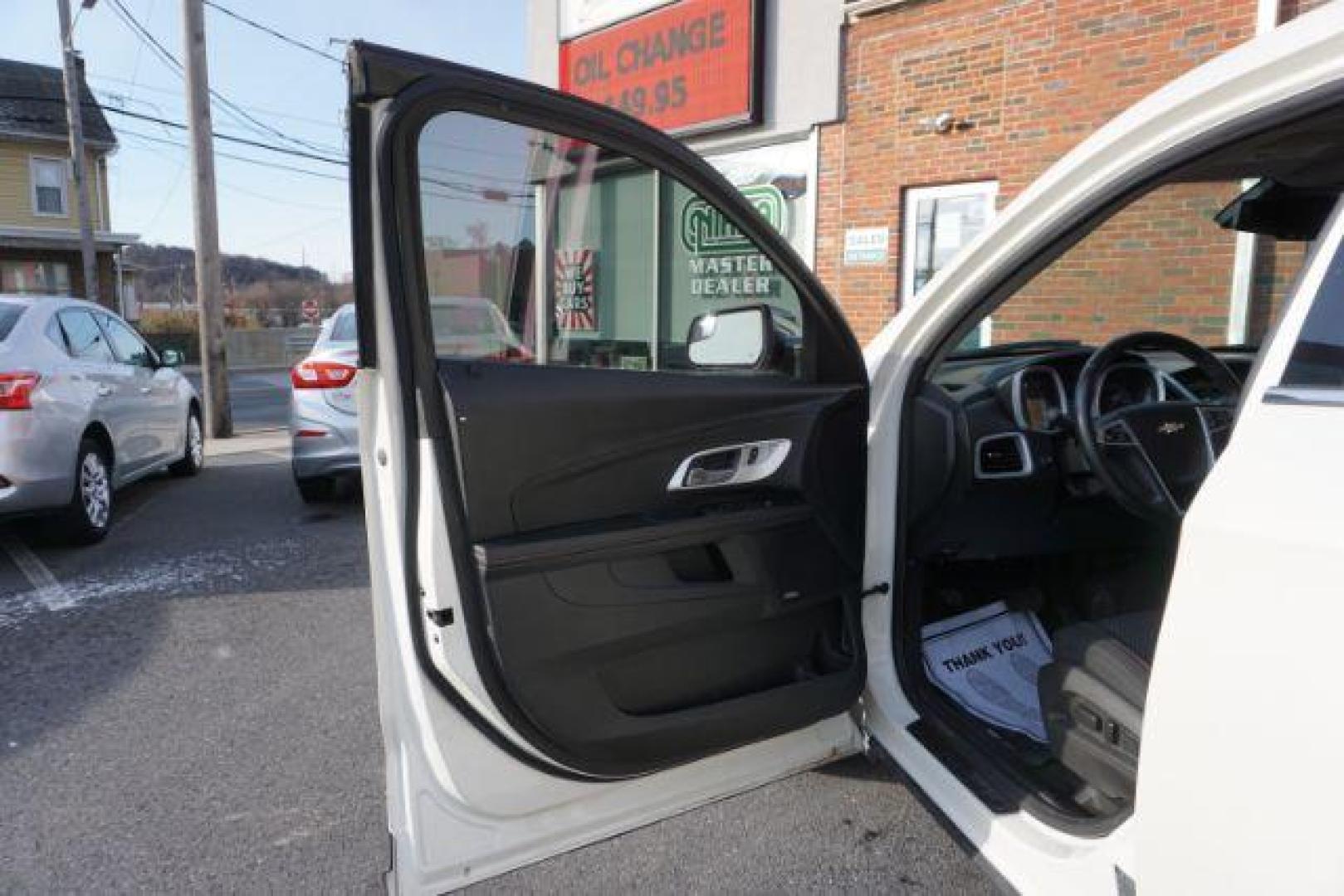 2013 Summit White /Jet Black Cloth Interior Chevrolet Equinox 2LT AWD (1GNFLNEK4DZ) with an 2.4L L4 DOHC 16V engine, 6-Speed Automatic transmission, located at 312 Centre Ave, Schuylkill Haven, PA, 17972, (570) 593-5278, 40.638130, -76.177383 - rear parking sensors, power drivers seat, power sunroof, remote engine starter, pioneer stereo - Photo#16