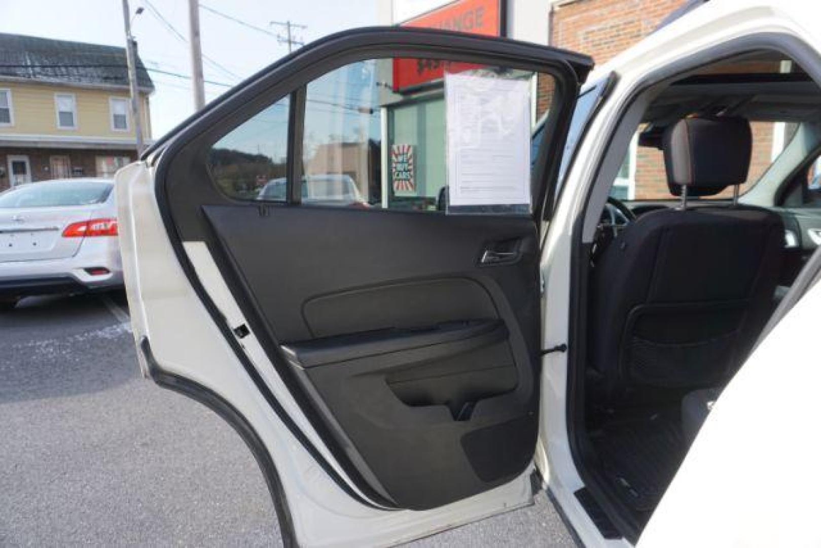 2013 Summit White /Jet Black Cloth Interior Chevrolet Equinox 2LT AWD (1GNFLNEK4DZ) with an 2.4L L4 DOHC 16V engine, 6-Speed Automatic transmission, located at 312 Centre Ave, Schuylkill Haven, PA, 17972, (570) 593-5278, 40.638130, -76.177383 - rear parking sensors, power drivers seat, power sunroof, remote engine starter, pioneer stereo - Photo#29