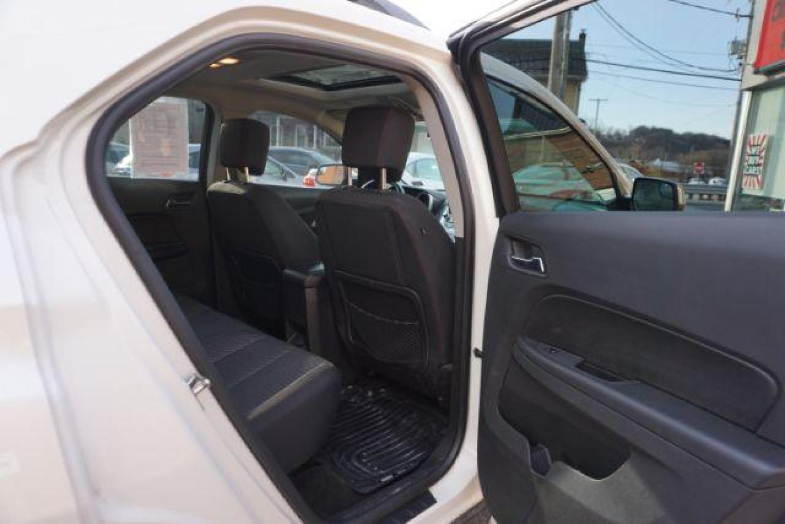 2013 Summit White /Jet Black Cloth Interior Chevrolet Equinox 2LT AWD (1GNFLNEK4DZ) with an 2.4L L4 DOHC 16V engine, 6-Speed Automatic transmission, located at 312 Centre Ave, Schuylkill Haven, PA, 17972, (570) 593-5278, 40.638130, -76.177383 - rear parking sensors, power drivers seat, power sunroof, remote engine starter, pioneer stereo - Photo#42