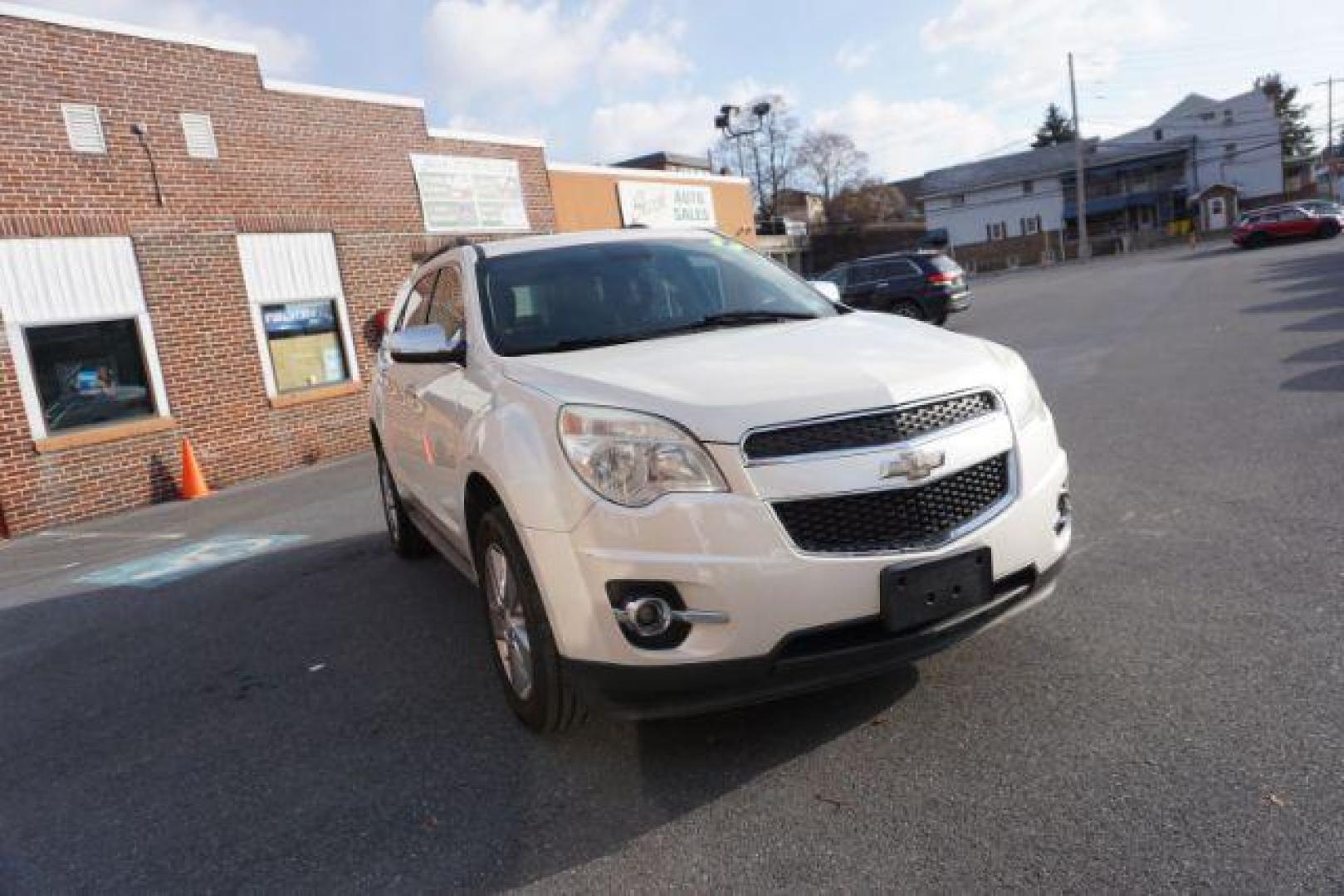 2013 Summit White /Jet Black Cloth Interior Chevrolet Equinox 2LT AWD (1GNFLNEK4DZ) with an 2.4L L4 DOHC 16V engine, 6-Speed Automatic transmission, located at 312 Centre Ave, Schuylkill Haven, PA, 17972, (570) 593-5278, 40.638130, -76.177383 - rear parking sensors, power drivers seat, power sunroof, remote engine starter, pioneer stereo - Photo#4