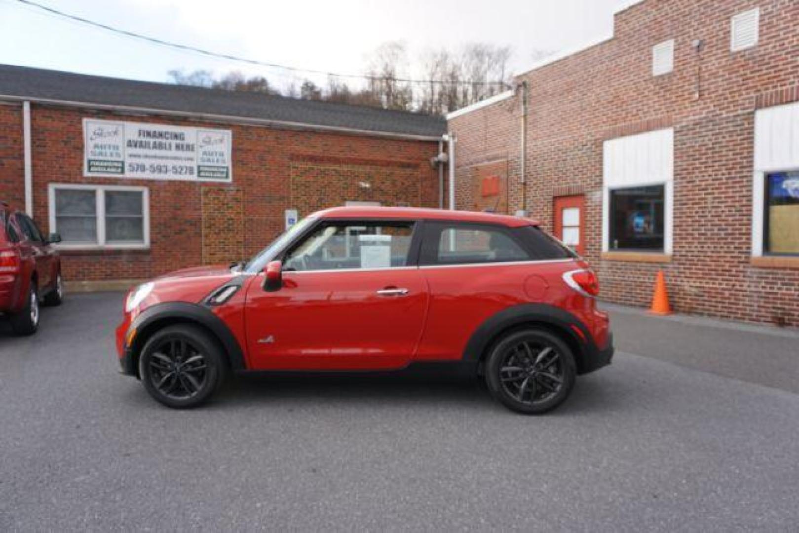 2013 Blazing Red Metallic /Carbon Black Mini Paceman S ALL4 (WMWSS7C57DW) with an 1.6L L4 DOHC 16V engine, 6-Speed Automatic transmission, located at 312 Centre Ave, Schuylkill Haven, PA, 17972, (570) 593-5278, 40.638130, -76.177383 - Photo#0