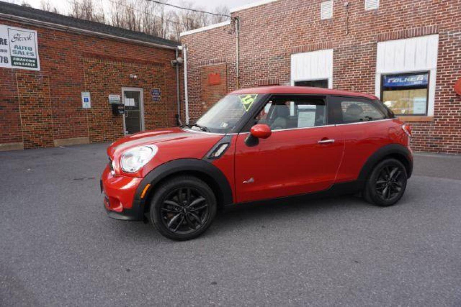 2013 Blazing Red Metallic /Carbon Black Mini Paceman S ALL4 (WMWSS7C57DW) with an 1.6L L4 DOHC 16V engine, 6-Speed Automatic transmission, located at 312 Centre Ave, Schuylkill Haven, PA, 17972, (570) 593-5278, 40.638130, -76.177383 - Photo#1