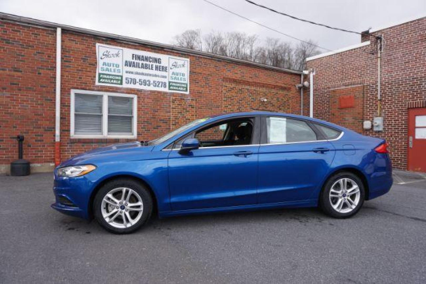 2018 Blue Metallic Ford Fusion SE (3FA6P0H73JR) with an 2.5L L4 DOHC 16V engine, 6-Speed Automatic transmission, located at 312 Centre Ave, Schuylkill Haven, PA, 17972, (570) 593-5278, 40.638130, -76.177383 - Photo#0