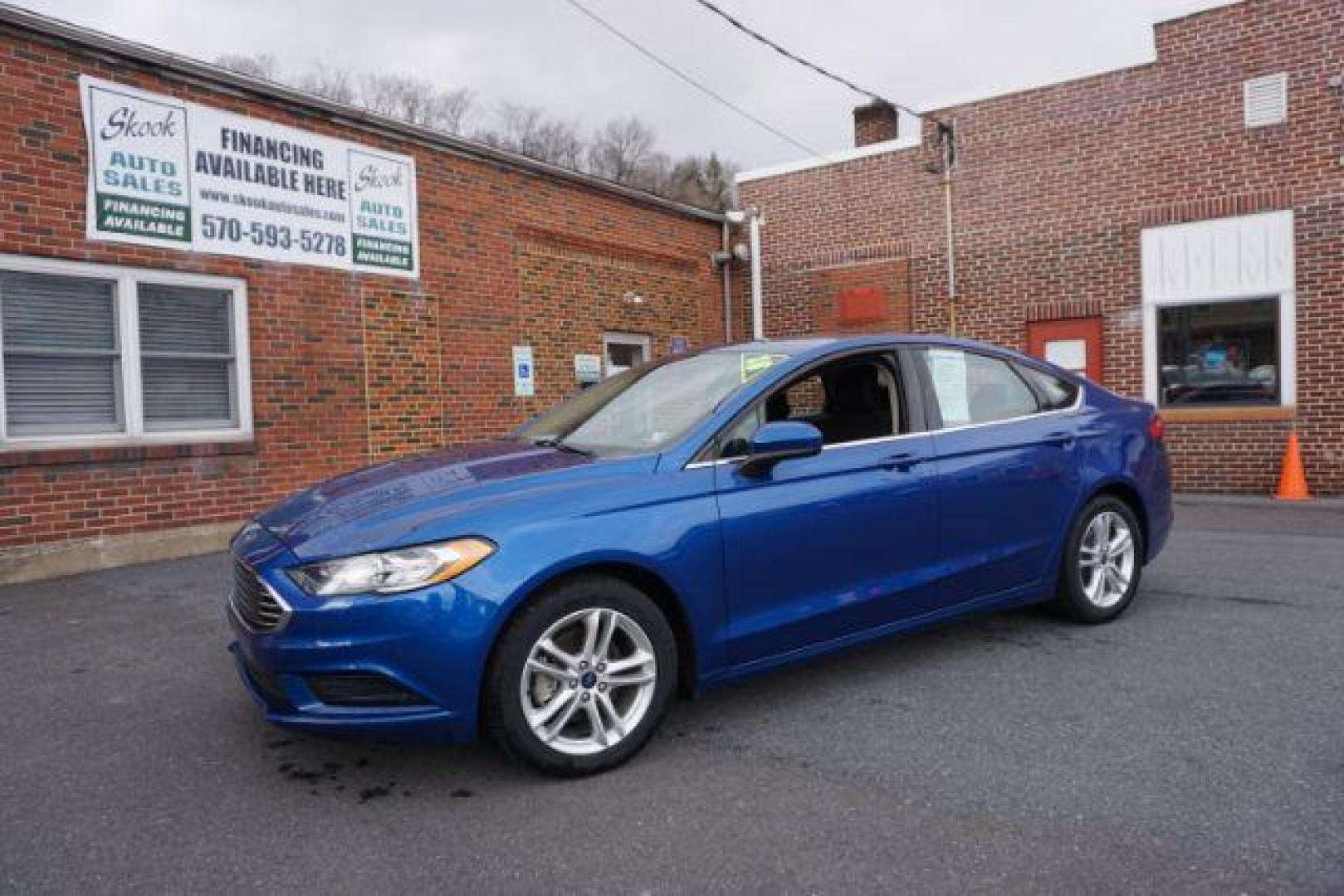 2018 Blue Metallic Ford Fusion SE (3FA6P0H73JR) with an 2.5L L4 DOHC 16V engine, 6-Speed Automatic transmission, located at 312 Centre Ave, Schuylkill Haven, PA, 17972, (570) 593-5278, 40.638130, -76.177383 - Photo#1