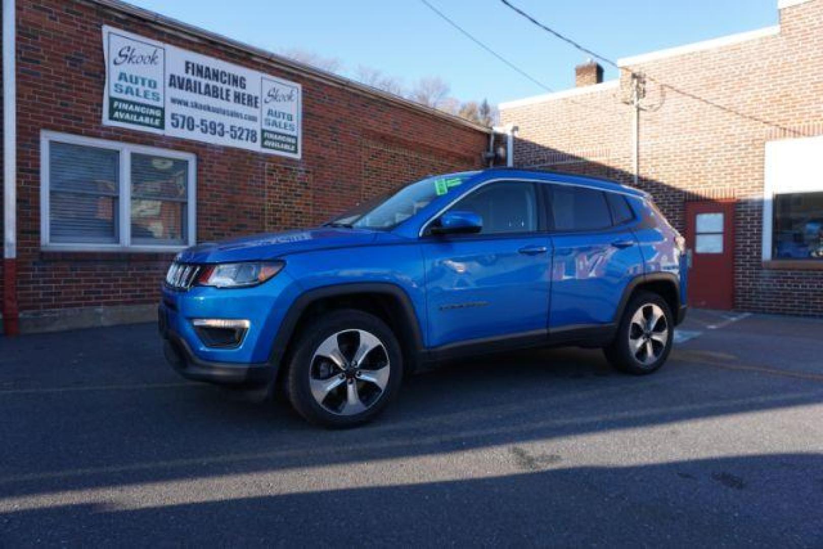 2018 Laser Blue Pearl Coat Jeep Compass Latitude 4WD (3C4NJDBB7JT) with an 2.4L L4 DOHC 16V engine, located at 312 Centre Ave, Schuylkill Haven, PA, 17972, (570) 593-5278, 40.638130, -76.177383 - collision avoidance system, HID headlamps, luggage rack, power liftgate - Photo#0