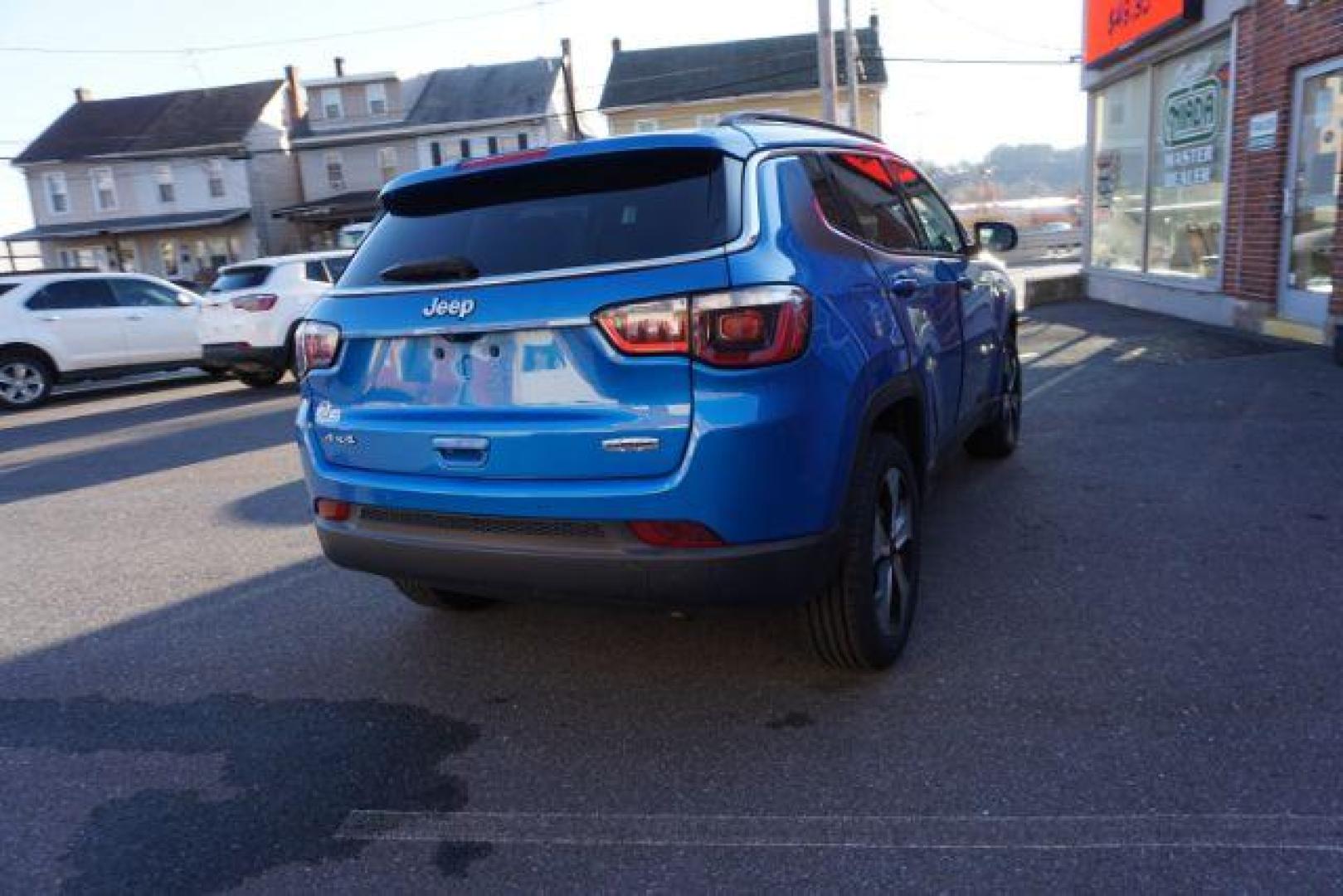 2018 Laser Blue Pearl Coat Jeep Compass Latitude 4WD (3C4NJDBB7JT) with an 2.4L L4 DOHC 16V engine, located at 312 Centre Ave, Schuylkill Haven, PA, 17972, (570) 593-5278, 40.638130, -76.177383 - collision avoidance system, HID headlamps, luggage rack, power liftgate - Photo#9