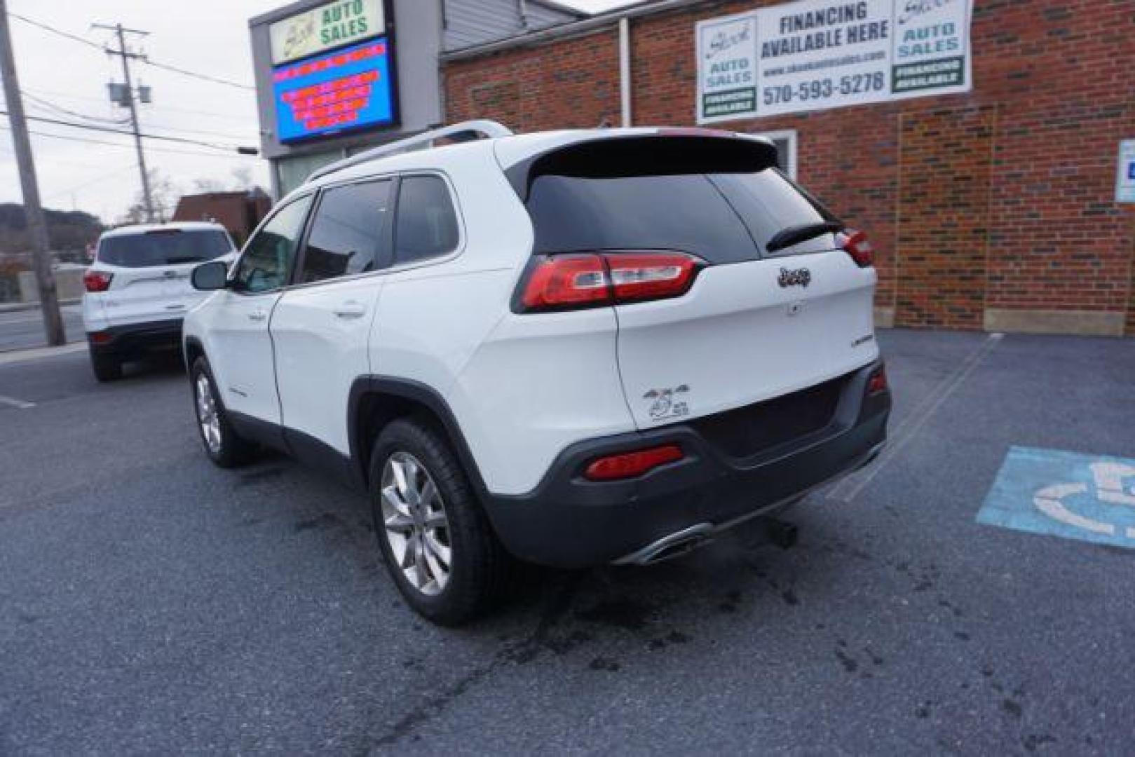 2015 Bright White Clearcoat /Light Frost Beige/Black Jeep Cherokee Limited 4WD (1C4PJMDS9FW) with an 3.2L V6 DOHC 24V engine, 9-Speed Automatic transmission, located at 312 Centre Ave, Schuylkill Haven, PA, 17972, (570) 593-5278, 40.638130, -76.177383 - automatic climate control, back up camera, blind spot monitor, lane departure warning, navigation system, passive keyless entry, rear parking sensors, univ garage door opener, aluminum/alloy wheels, heated exterior mirrors, leather seats, power driver's seat, power sunroof, remote engine starter, st - Photo#9