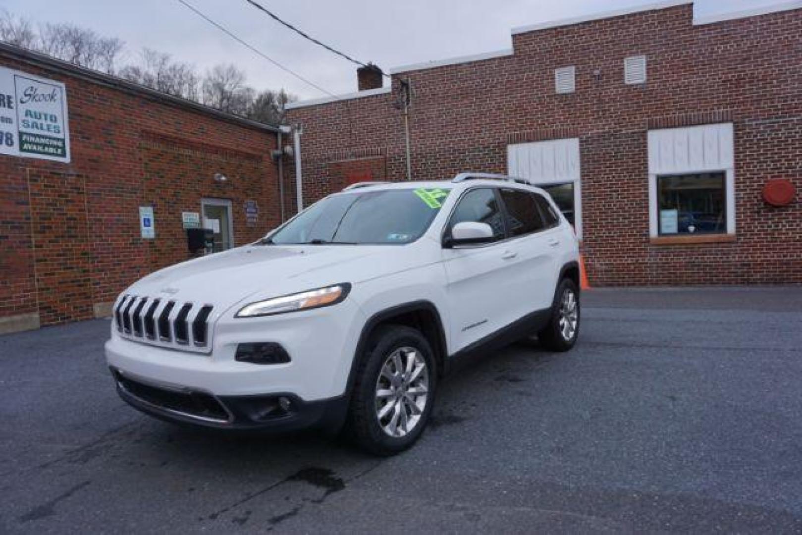 2015 Bright White Clearcoat /Light Frost Beige/Black Jeep Cherokee Limited 4WD (1C4PJMDS9FW) with an 3.2L V6 DOHC 24V engine, 9-Speed Automatic transmission, located at 312 Centre Ave, Schuylkill Haven, PA, 17972, (570) 593-5278, 40.638130, -76.177383 - automatic climate control, back up camera, blind spot monitor, lane departure warning, navigation system, passive keyless entry, rear parking sensors, univ garage door opener, aluminum/alloy wheels, heated exterior mirrors, leather seats, power driver's seat, power sunroof, remote engine starter, st - Photo#1