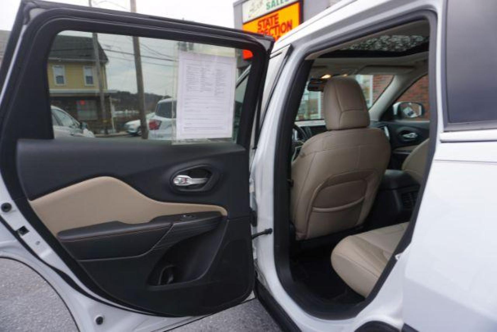 2015 Bright White Clearcoat /Light Frost Beige/Black Jeep Cherokee Limited 4WD (1C4PJMDS9FW) with an 3.2L V6 DOHC 24V engine, 9-Speed Automatic transmission, located at 312 Centre Ave, Schuylkill Haven, PA, 17972, (570) 593-5278, 40.638130, -76.177383 - automatic climate control, back up camera, blind spot monitor, lane departure warning, navigation system, passive keyless entry, rear parking sensors, univ garage door opener, aluminum/alloy wheels, heated exterior mirrors, leather seats, power driver's seat, power sunroof, remote engine starter, st - Photo#28