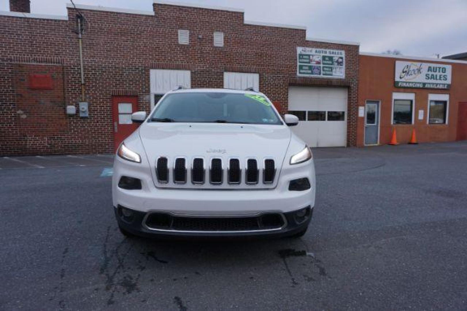 2015 Bright White Clearcoat /Light Frost Beige/Black Jeep Cherokee Limited 4WD (1C4PJMDS9FW) with an 3.2L V6 DOHC 24V engine, 9-Speed Automatic transmission, located at 312 Centre Ave, Schuylkill Haven, PA, 17972, (570) 593-5278, 40.638130, -76.177383 - automatic climate control, back up camera, blind spot monitor, lane departure warning, navigation system, passive keyless entry, rear parking sensors, univ garage door opener, aluminum/alloy wheels, heated exterior mirrors, leather seats, power driver's seat, power sunroof, remote engine starter, st - Photo#2