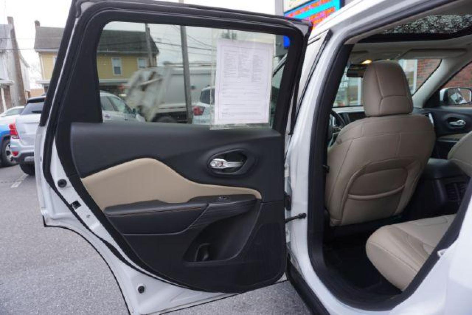 2015 Bright White Clearcoat /Light Frost Beige/Black Jeep Cherokee Limited 4WD (1C4PJMDS9FW) with an 3.2L V6 DOHC 24V engine, 9-Speed Automatic transmission, located at 312 Centre Ave, Schuylkill Haven, PA, 17972, (570) 593-5278, 40.638130, -76.177383 - automatic climate control, back up camera, blind spot monitor, lane departure warning, navigation system, passive keyless entry, rear parking sensors, univ garage door opener, aluminum/alloy wheels, heated exterior mirrors, leather seats, power driver's seat, power sunroof, remote engine starter, st - Photo#29