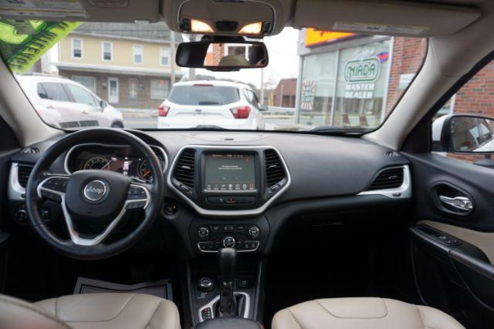 2015 Bright White Clearcoat /Light Frost Beige/Black Jeep Cherokee Limited 4WD (1C4PJMDS9FW) with an 3.2L V6 DOHC 24V engine, 9-Speed Automatic transmission, located at 312 Centre Ave, Schuylkill Haven, PA, 17972, (570) 593-5278, 40.638130, -76.177383 - automatic climate control, back up camera, blind spot monitor, lane departure warning, navigation system, passive keyless entry, rear parking sensors, univ garage door opener, aluminum/alloy wheels, heated exterior mirrors, leather seats, power driver's seat, power sunroof, remote engine starter, st - Photo#36