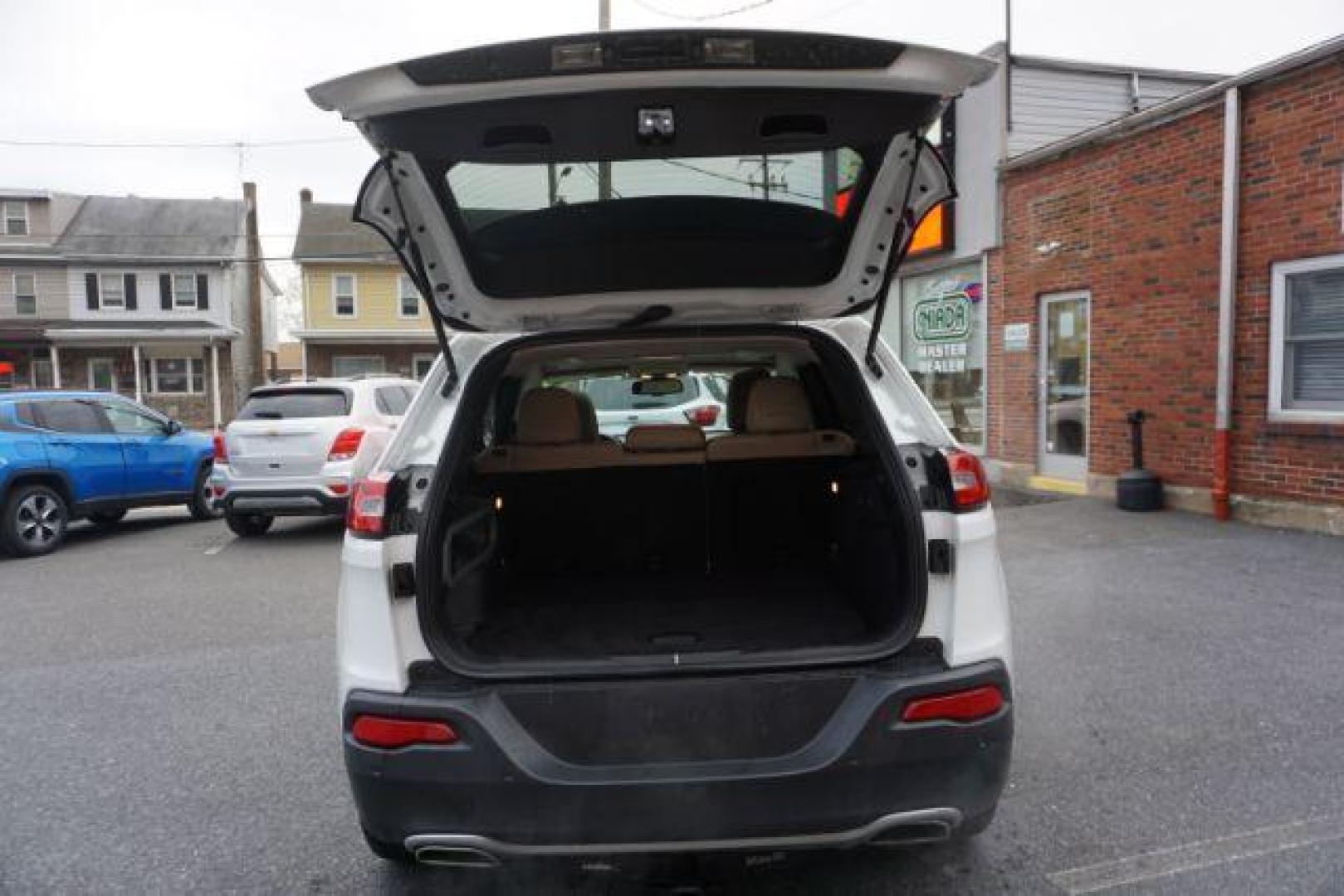 2015 Bright White Clearcoat /Light Frost Beige/Black Jeep Cherokee Limited 4WD (1C4PJMDS9FW) with an 3.2L V6 DOHC 24V engine, 9-Speed Automatic transmission, located at 312 Centre Ave, Schuylkill Haven, PA, 17972, (570) 593-5278, 40.638130, -76.177383 - automatic climate control, back up camera, blind spot monitor, lane departure warning, navigation system, passive keyless entry, rear parking sensors, univ garage door opener, aluminum/alloy wheels, heated exterior mirrors, leather seats, power driver's seat, power sunroof, remote engine starter, st - Photo#38