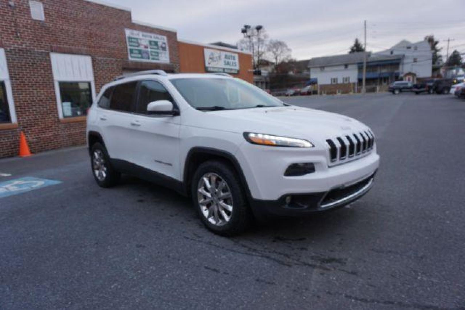 2015 Bright White Clearcoat /Light Frost Beige/Black Jeep Cherokee Limited 4WD (1C4PJMDS9FW) with an 3.2L V6 DOHC 24V engine, 9-Speed Automatic transmission, located at 312 Centre Ave, Schuylkill Haven, PA, 17972, (570) 593-5278, 40.638130, -76.177383 - automatic climate control, back up camera, blind spot monitor, lane departure warning, navigation system, passive keyless entry, rear parking sensors, univ garage door opener, aluminum/alloy wheels, heated exterior mirrors, leather seats, power driver's seat, power sunroof, remote engine starter, st - Photo#3