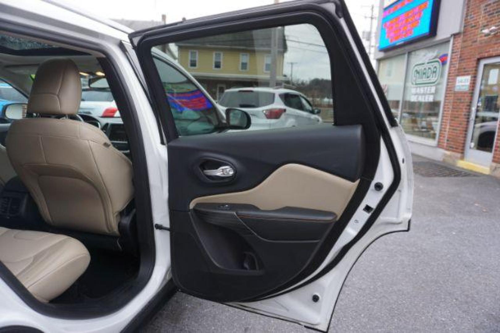 2015 Bright White Clearcoat /Light Frost Beige/Black Jeep Cherokee Limited 4WD (1C4PJMDS9FW) with an 3.2L V6 DOHC 24V engine, 9-Speed Automatic transmission, located at 312 Centre Ave, Schuylkill Haven, PA, 17972, (570) 593-5278, 40.638130, -76.177383 - automatic climate control, back up camera, blind spot monitor, lane departure warning, navigation system, passive keyless entry, rear parking sensors, univ garage door opener, aluminum/alloy wheels, heated exterior mirrors, leather seats, power driver's seat, power sunroof, remote engine starter, st - Photo#40