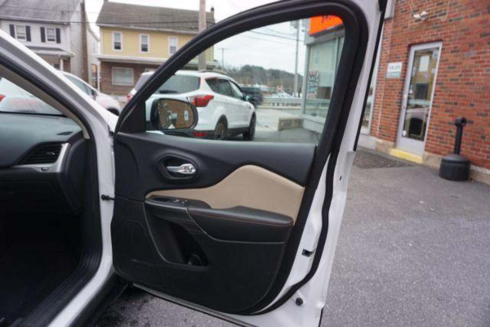 2015 Bright White Clearcoat /Light Frost Beige/Black Jeep Cherokee Limited 4WD (1C4PJMDS9FW) with an 3.2L V6 DOHC 24V engine, 9-Speed Automatic transmission, located at 312 Centre Ave, Schuylkill Haven, PA, 17972, (570) 593-5278, 40.638130, -76.177383 - automatic climate control, back up camera, blind spot monitor, lane departure warning, navigation system, passive keyless entry, rear parking sensors, univ garage door opener, aluminum/alloy wheels, heated exterior mirrors, leather seats, power driver's seat, power sunroof, remote engine starter, st - Photo#45