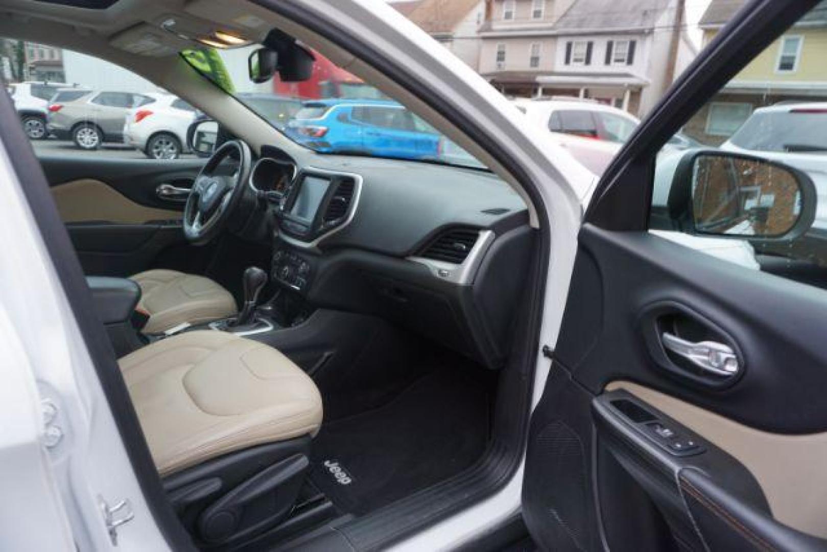 2015 Bright White Clearcoat /Light Frost Beige/Black Jeep Cherokee Limited 4WD (1C4PJMDS9FW) with an 3.2L V6 DOHC 24V engine, 9-Speed Automatic transmission, located at 312 Centre Ave, Schuylkill Haven, PA, 17972, (570) 593-5278, 40.638130, -76.177383 - automatic climate control, back up camera, blind spot monitor, lane departure warning, navigation system, passive keyless entry, rear parking sensors, univ garage door opener, aluminum/alloy wheels, heated exterior mirrors, leather seats, power driver's seat, power sunroof, remote engine starter, st - Photo#46