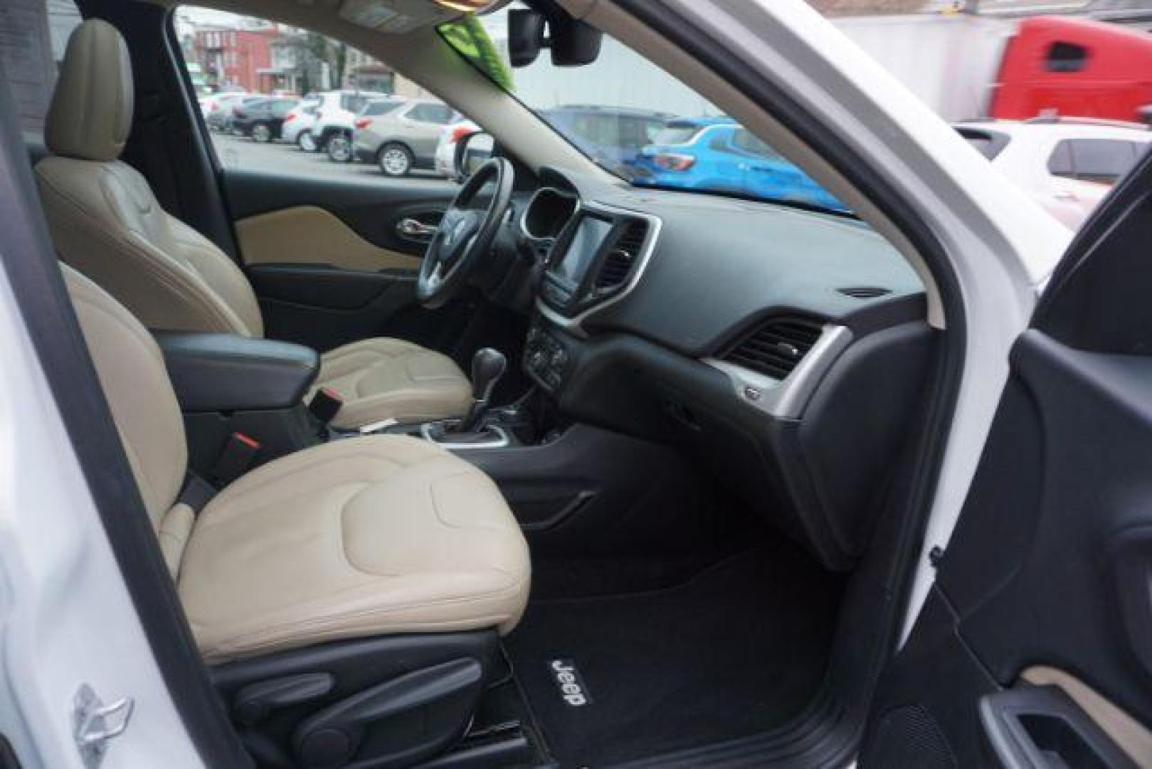 2015 Bright White Clearcoat /Light Frost Beige/Black Jeep Cherokee Limited 4WD (1C4PJMDS9FW) with an 3.2L V6 DOHC 24V engine, 9-Speed Automatic transmission, located at 312 Centre Ave, Schuylkill Haven, PA, 17972, (570) 593-5278, 40.638130, -76.177383 - automatic climate control, back up camera, blind spot monitor, lane departure warning, navigation system, passive keyless entry, rear parking sensors, univ garage door opener, aluminum/alloy wheels, heated exterior mirrors, leather seats, power driver's seat, power sunroof, remote engine starter, st - Photo#47