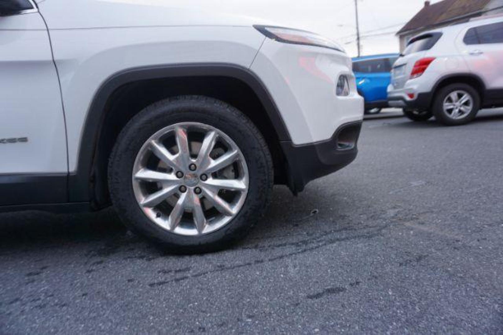 2015 Bright White Clearcoat /Light Frost Beige/Black Jeep Cherokee Limited 4WD (1C4PJMDS9FW) with an 3.2L V6 DOHC 24V engine, 9-Speed Automatic transmission, located at 312 Centre Ave, Schuylkill Haven, PA, 17972, (570) 593-5278, 40.638130, -76.177383 - automatic climate control, back up camera, blind spot monitor, lane departure warning, navigation system, passive keyless entry, rear parking sensors, univ garage door opener, aluminum/alloy wheels, heated exterior mirrors, leather seats, power driver's seat, power sunroof, remote engine starter, st - Photo#4