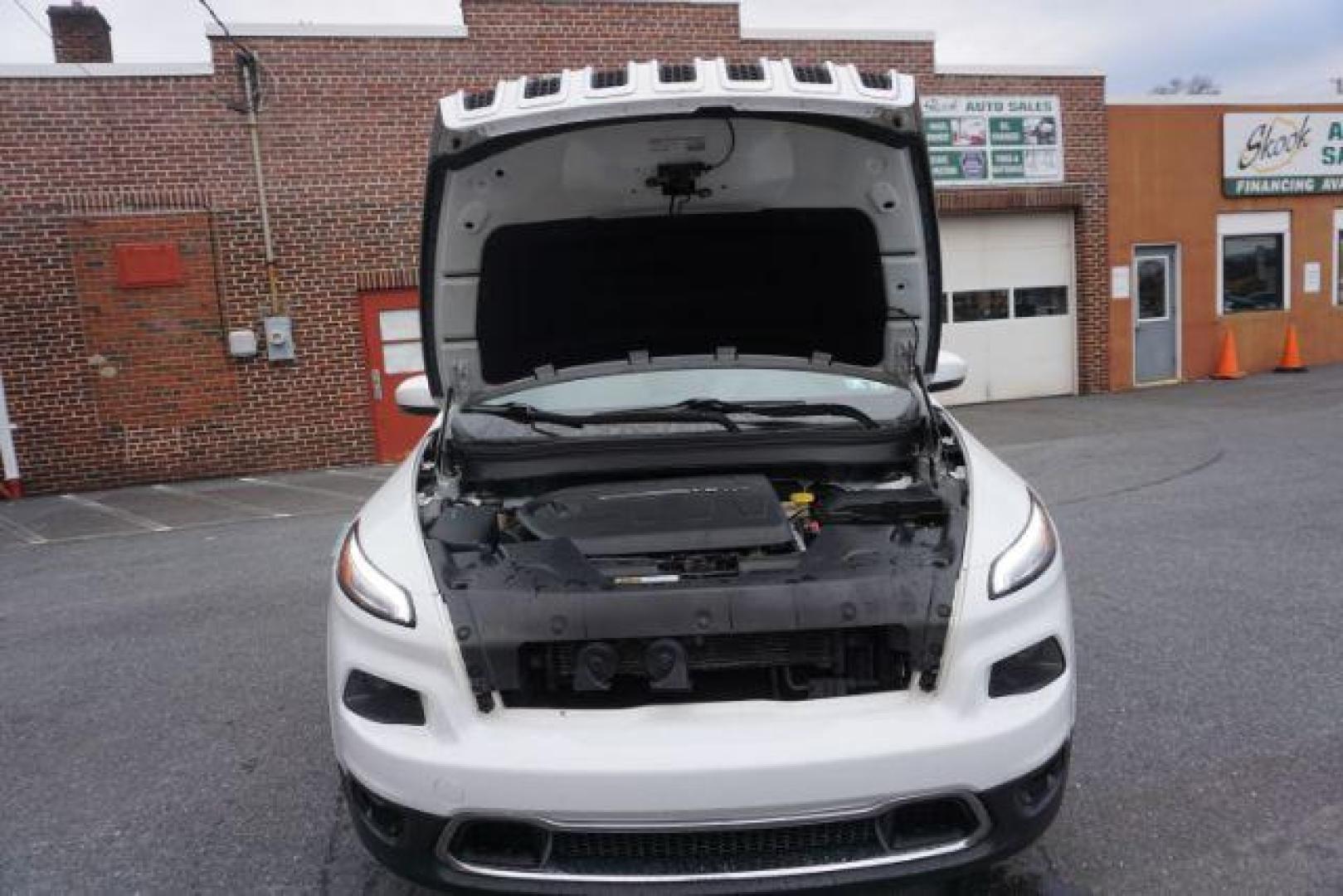 2015 Bright White Clearcoat /Light Frost Beige/Black Jeep Cherokee Limited 4WD (1C4PJMDS9FW) with an 3.2L V6 DOHC 24V engine, 9-Speed Automatic transmission, located at 312 Centre Ave, Schuylkill Haven, PA, 17972, (570) 593-5278, 40.638130, -76.177383 - automatic climate control, back up camera, blind spot monitor, lane departure warning, navigation system, passive keyless entry, rear parking sensors, univ garage door opener, aluminum/alloy wheels, heated exterior mirrors, leather seats, power driver's seat, power sunroof, remote engine starter, st - Photo#51