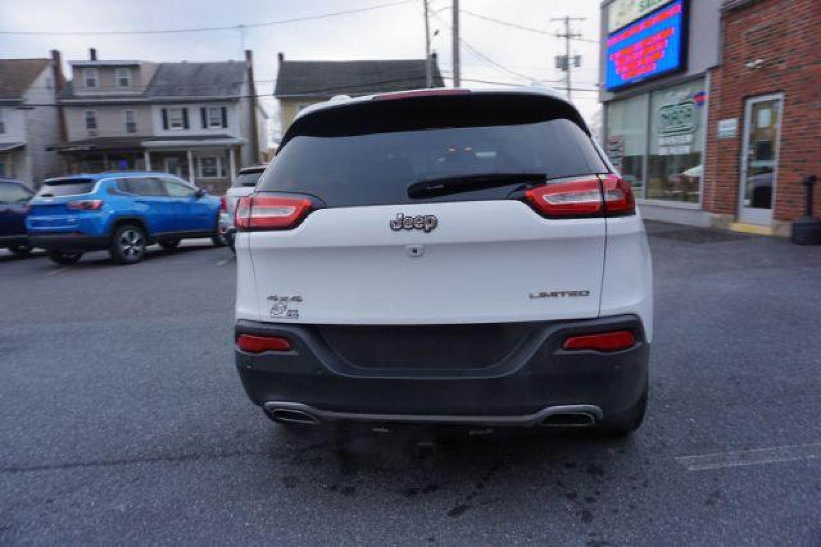 2015 Bright White Clearcoat /Light Frost Beige/Black Jeep Cherokee Limited 4WD (1C4PJMDS9FW) with an 3.2L V6 DOHC 24V engine, 9-Speed Automatic transmission, located at 312 Centre Ave, Schuylkill Haven, PA, 17972, (570) 593-5278, 40.638130, -76.177383 - automatic climate control, back up camera, blind spot monitor, lane departure warning, navigation system, passive keyless entry, rear parking sensors, univ garage door opener, aluminum/alloy wheels, heated exterior mirrors, leather seats, power driver's seat, power sunroof, remote engine starter, st - Photo#8