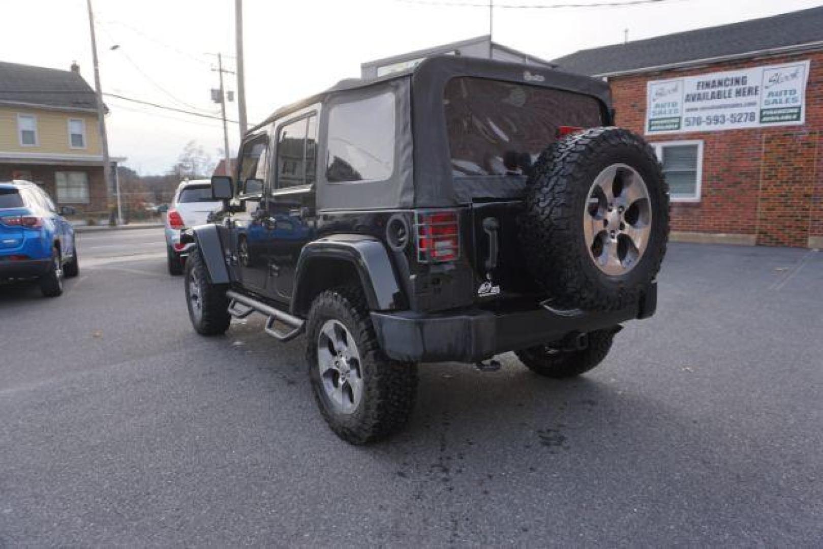 2016 Black Clear Coat /Black, leather Jeep Wrangler Unlimited Sahara 4WD (1C4BJWEG4GL) with an 3.6L V6 DOHC 24V FFV engine, 5-Speed Automatic transmission, located at 312 Centre Ave, Schuylkill Haven, PA, 17972, (570) 593-5278, 40.638130, -76.177383 - automatic climate control, bluetooth, navigation, fixed running boards, hard top, leather seats, remote engine starter, towing pkg, heated front seats, Alpine stereo system - Photo#11