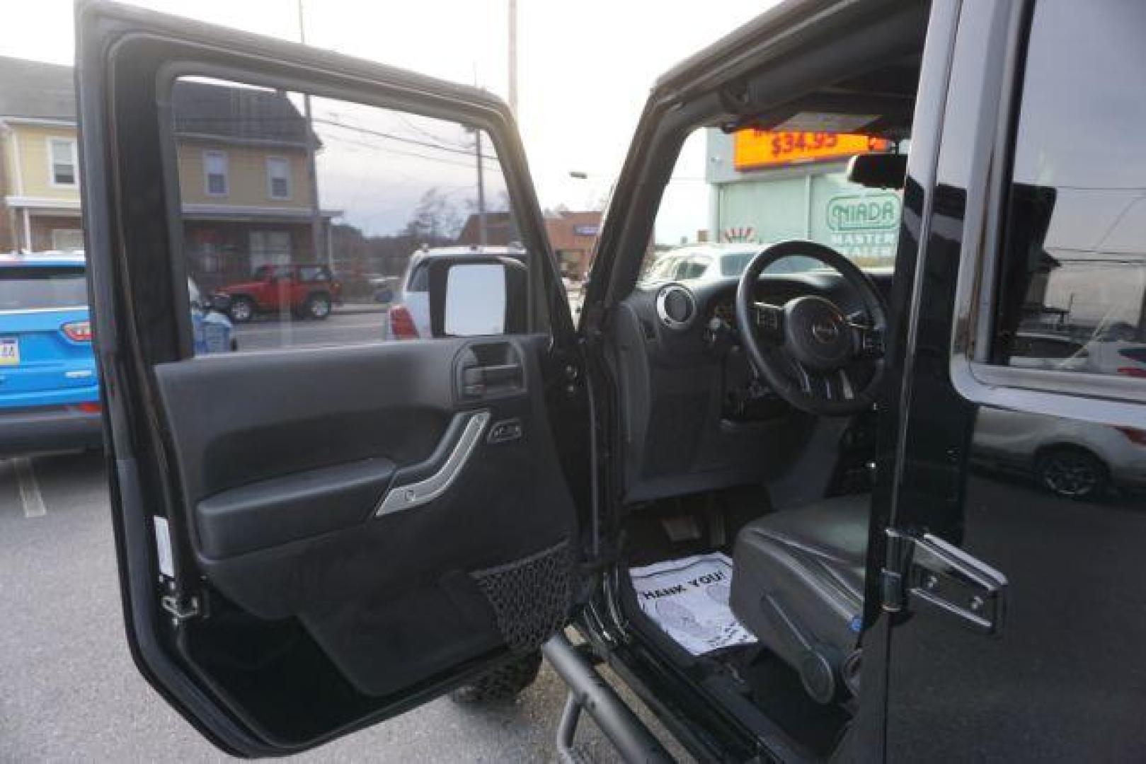 2016 Black Clear Coat /Black, leather Jeep Wrangler Unlimited Sahara 4WD (1C4BJWEG4GL) with an 3.6L V6 DOHC 24V FFV engine, 5-Speed Automatic transmission, located at 312 Centre Ave, Schuylkill Haven, PA, 17972, (570) 593-5278, 40.638130, -76.177383 - automatic climate control, bluetooth, navigation, fixed running boards, hard top, leather seats, remote engine starter, towing pkg, heated front seats, Alpine stereo system - Photo#15