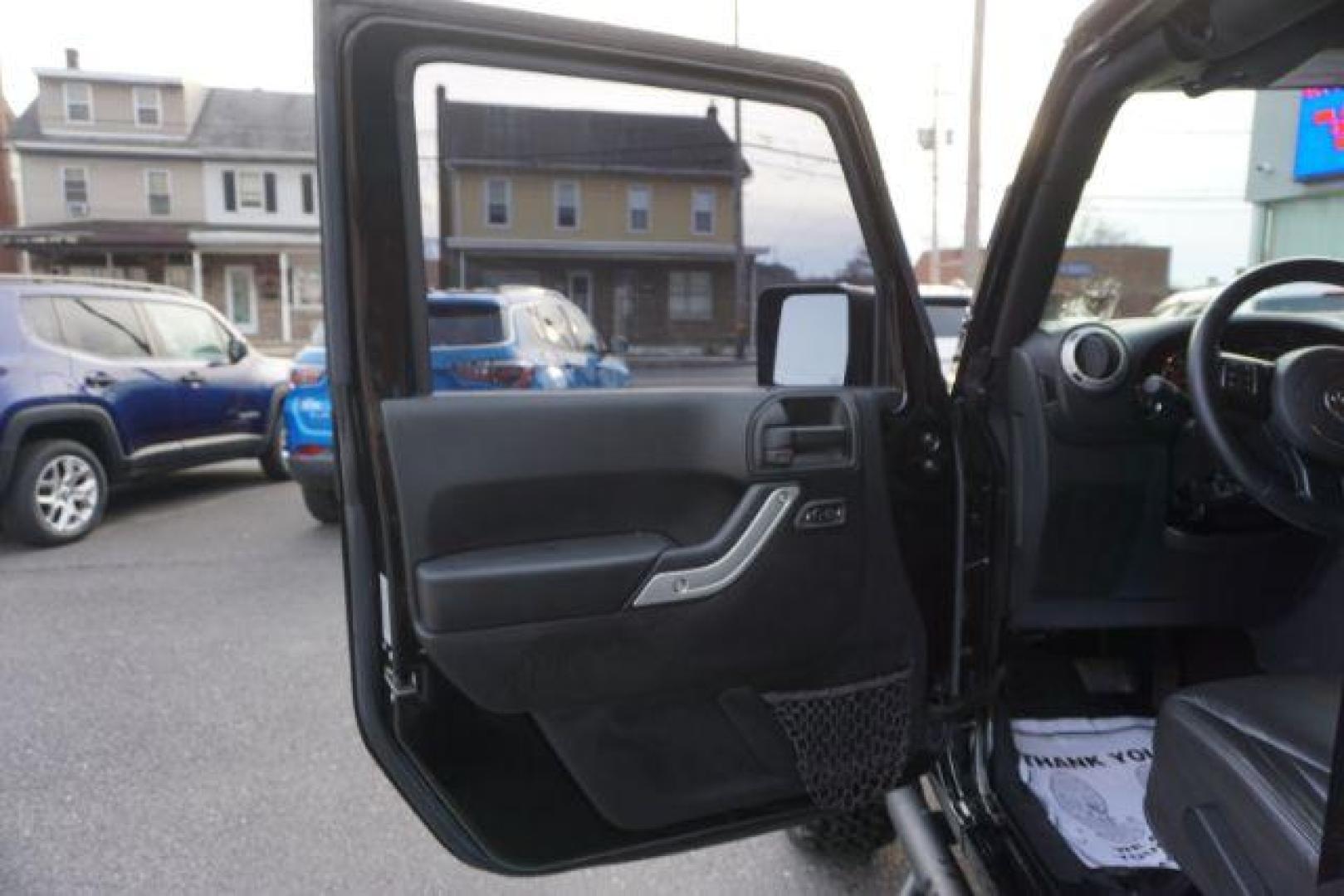 2016 Black Clear Coat /Black, leather Jeep Wrangler Unlimited Sahara 4WD (1C4BJWEG4GL) with an 3.6L V6 DOHC 24V FFV engine, 5-Speed Automatic transmission, located at 312 Centre Ave, Schuylkill Haven, PA, 17972, (570) 593-5278, 40.638130, -76.177383 - automatic climate control, bluetooth, navigation, fixed running boards, hard top, leather seats, remote engine starter, towing pkg, heated front seats, Alpine stereo system - Photo#16