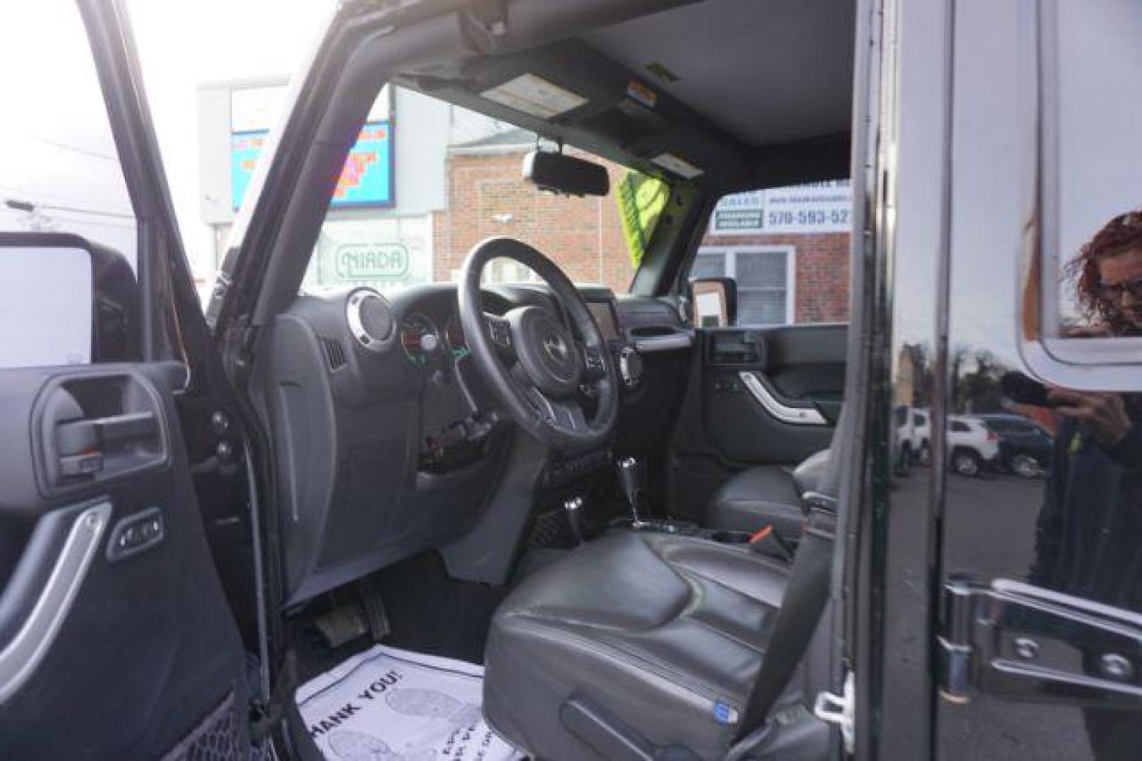 2016 Black Clear Coat /Black, leather Jeep Wrangler Unlimited Sahara 4WD (1C4BJWEG4GL) with an 3.6L V6 DOHC 24V FFV engine, 5-Speed Automatic transmission, located at 312 Centre Ave, Schuylkill Haven, PA, 17972, (570) 593-5278, 40.638130, -76.177383 - automatic climate control, bluetooth, navigation, fixed running boards, hard top, leather seats, remote engine starter, towing pkg, heated front seats, Alpine stereo system - Photo#17