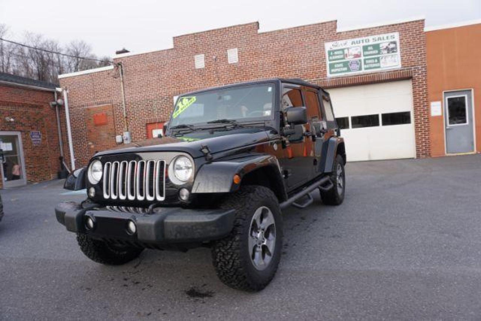 2016 Black Clear Coat /Black, leather Jeep Wrangler Unlimited Sahara 4WD (1C4BJWEG4GL) with an 3.6L V6 DOHC 24V FFV engine, 5-Speed Automatic transmission, located at 312 Centre Ave, Schuylkill Haven, PA, 17972, (570) 593-5278, 40.638130, -76.177383 - automatic climate control, bluetooth, navigation, fixed running boards, hard top, leather seats, remote engine starter, towing pkg, heated front seats, Alpine stereo system - Photo#2