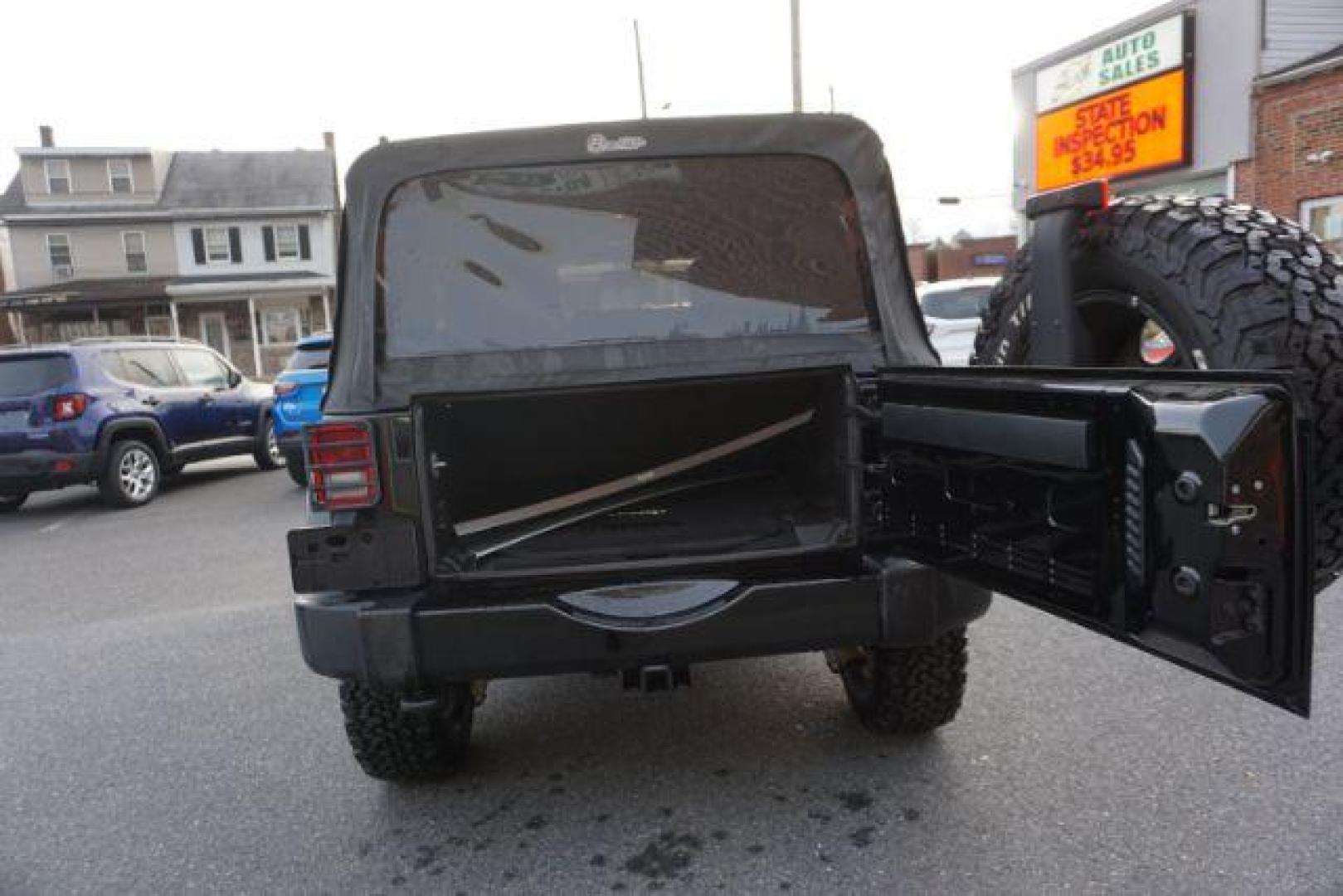 2016 Black Clear Coat /Black, leather Jeep Wrangler Unlimited Sahara 4WD (1C4BJWEG4GL) with an 3.6L V6 DOHC 24V FFV engine, 5-Speed Automatic transmission, located at 312 Centre Ave, Schuylkill Haven, PA, 17972, (570) 593-5278, 40.638130, -76.177383 - automatic climate control, bluetooth, navigation, fixed running boards, hard top, leather seats, remote engine starter, towing pkg, heated front seats, Alpine stereo system - Photo#40