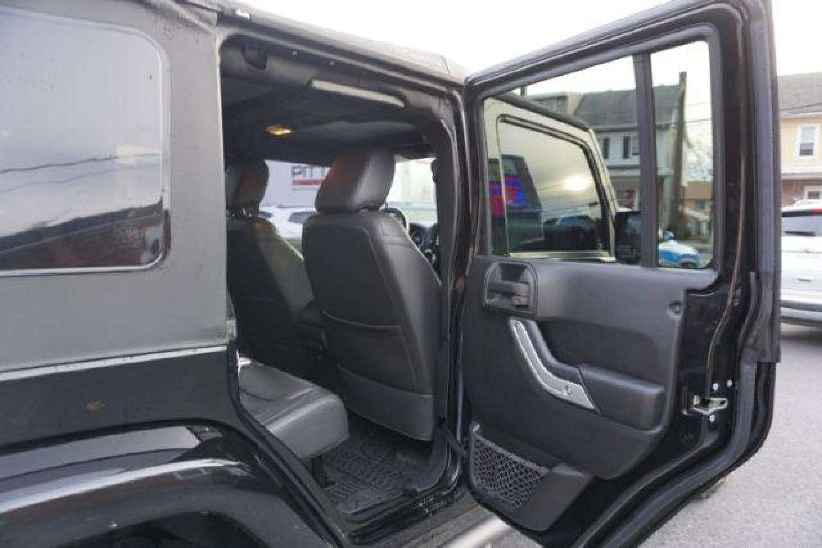 2016 Black Clear Coat /Black, leather Jeep Wrangler Unlimited Sahara 4WD (1C4BJWEG4GL) with an 3.6L V6 DOHC 24V FFV engine, 5-Speed Automatic transmission, located at 312 Centre Ave, Schuylkill Haven, PA, 17972, (570) 593-5278, 40.638130, -76.177383 - automatic climate control, bluetooth, navigation, fixed running boards, hard top, leather seats, remote engine starter, towing pkg, heated front seats, Alpine stereo system - Photo#41