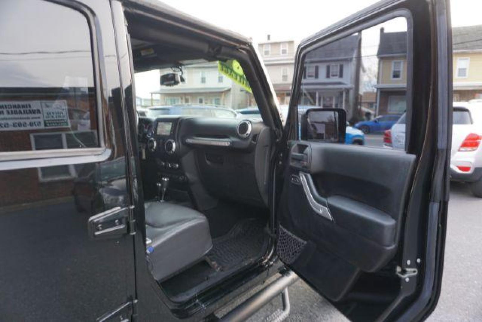 2016 Black Clear Coat /Black, leather Jeep Wrangler Unlimited Sahara 4WD (1C4BJWEG4GL) with an 3.6L V6 DOHC 24V FFV engine, 5-Speed Automatic transmission, located at 312 Centre Ave, Schuylkill Haven, PA, 17972, (570) 593-5278, 40.638130, -76.177383 - automatic climate control, bluetooth, navigation, fixed running boards, hard top, leather seats, remote engine starter, towing pkg, heated front seats, Alpine stereo system - Photo#46