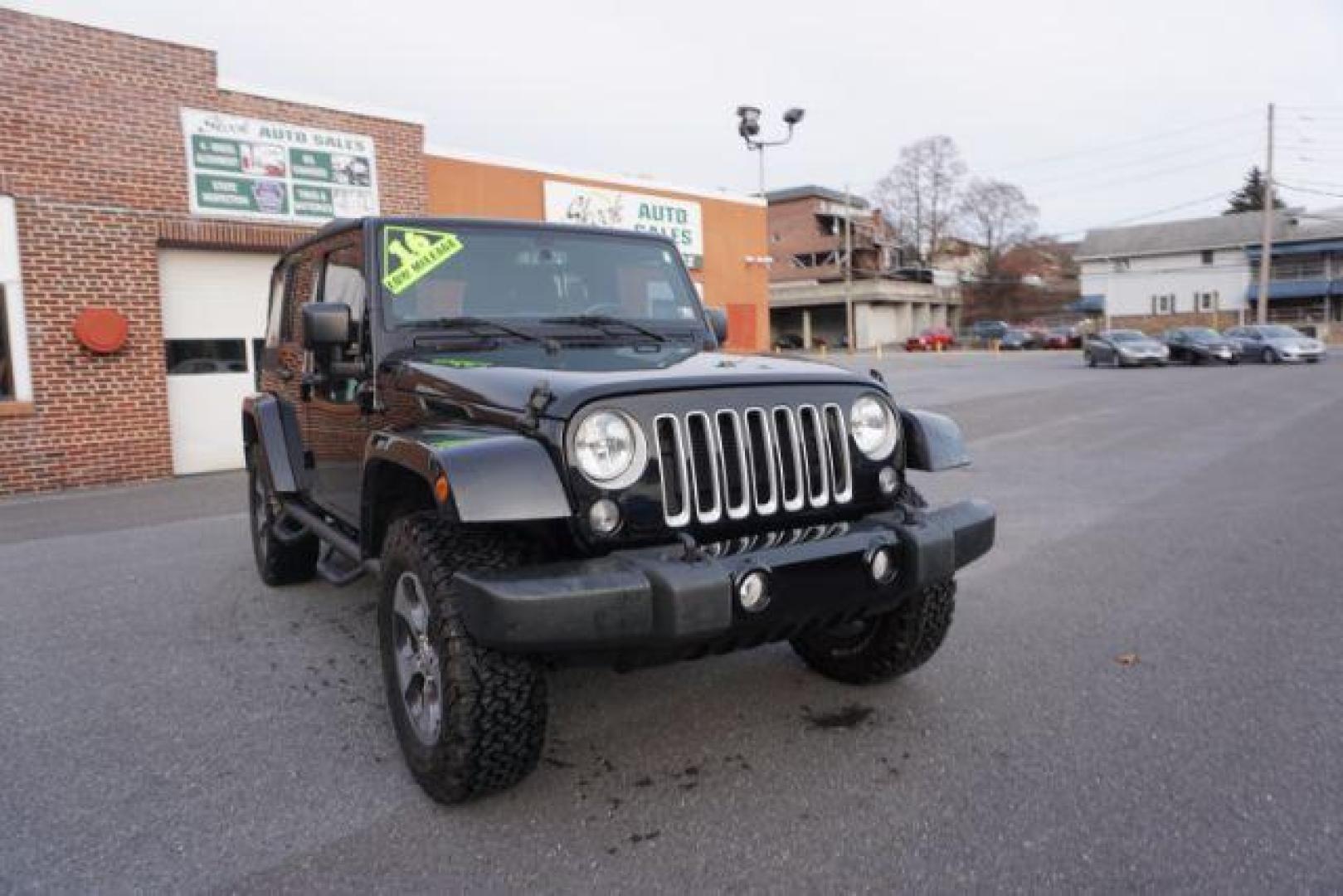 2016 Black Clear Coat /Black, leather Jeep Wrangler Unlimited Sahara 4WD (1C4BJWEG4GL) with an 3.6L V6 DOHC 24V FFV engine, 5-Speed Automatic transmission, located at 312 Centre Ave, Schuylkill Haven, PA, 17972, (570) 593-5278, 40.638130, -76.177383 - automatic climate control, bluetooth, navigation, fixed running boards, hard top, leather seats, remote engine starter, towing pkg, heated front seats, Alpine stereo system - Photo#4