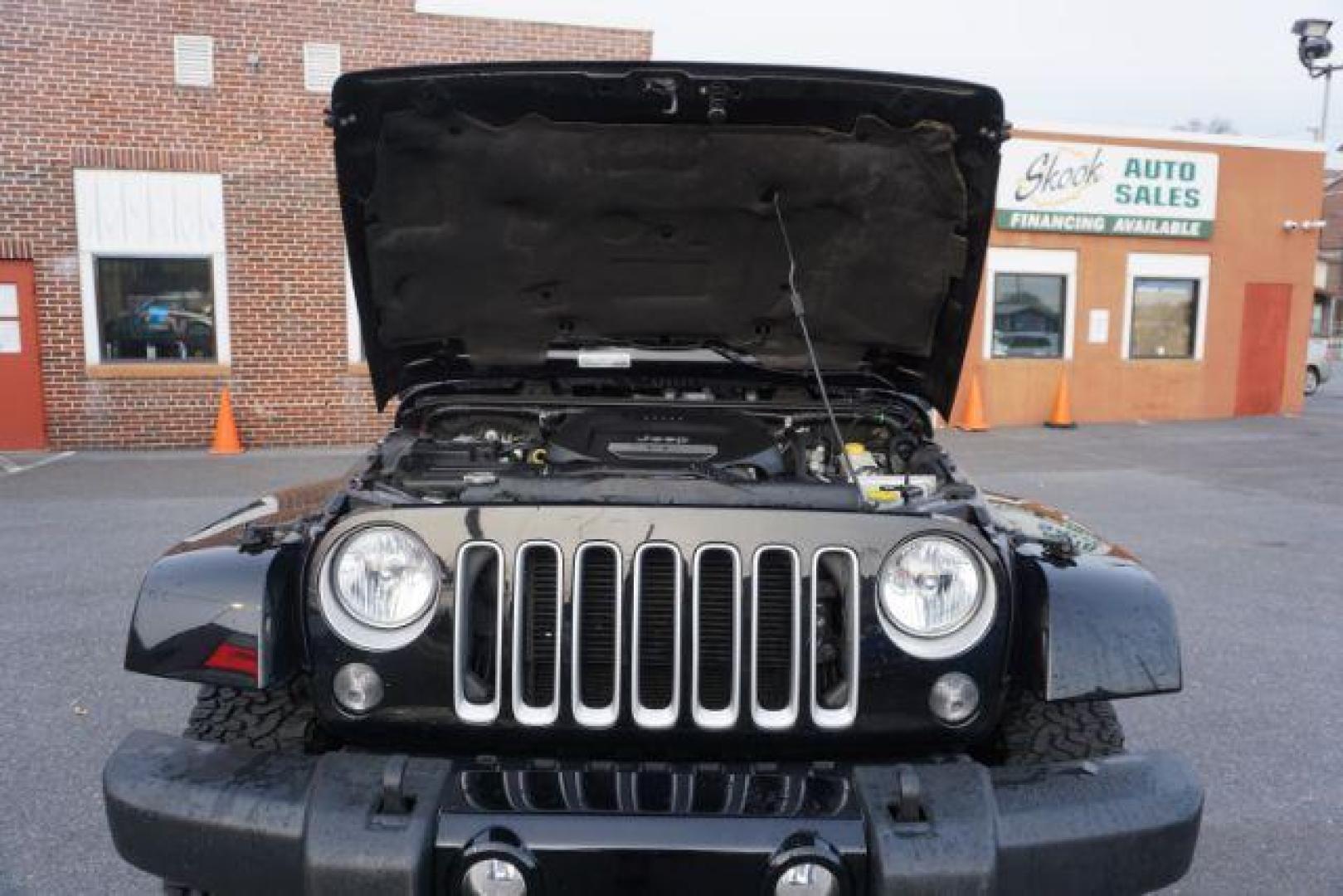 2016 Black Clear Coat /Black, leather Jeep Wrangler Unlimited Sahara 4WD (1C4BJWEG4GL) with an 3.6L V6 DOHC 24V FFV engine, 5-Speed Automatic transmission, located at 312 Centre Ave, Schuylkill Haven, PA, 17972, (570) 593-5278, 40.638130, -76.177383 - automatic climate control, bluetooth, navigation, fixed running boards, hard top, leather seats, remote engine starter, towing pkg, heated front seats, Alpine stereo system - Photo#53